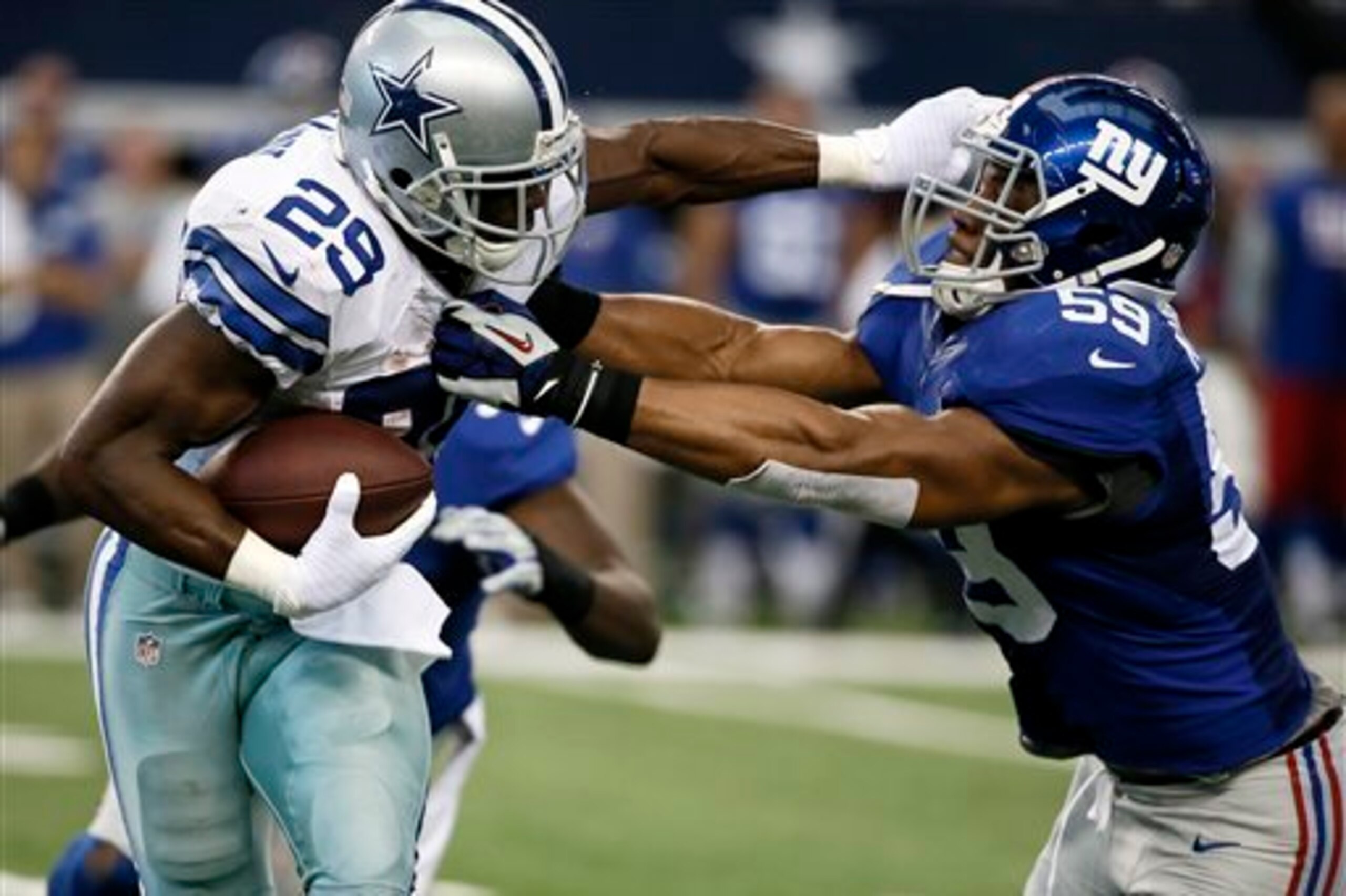 Devon Kennard grappling with DeMarco Murray last season. Devon Kennard grappling with DeMarco Murray last season.