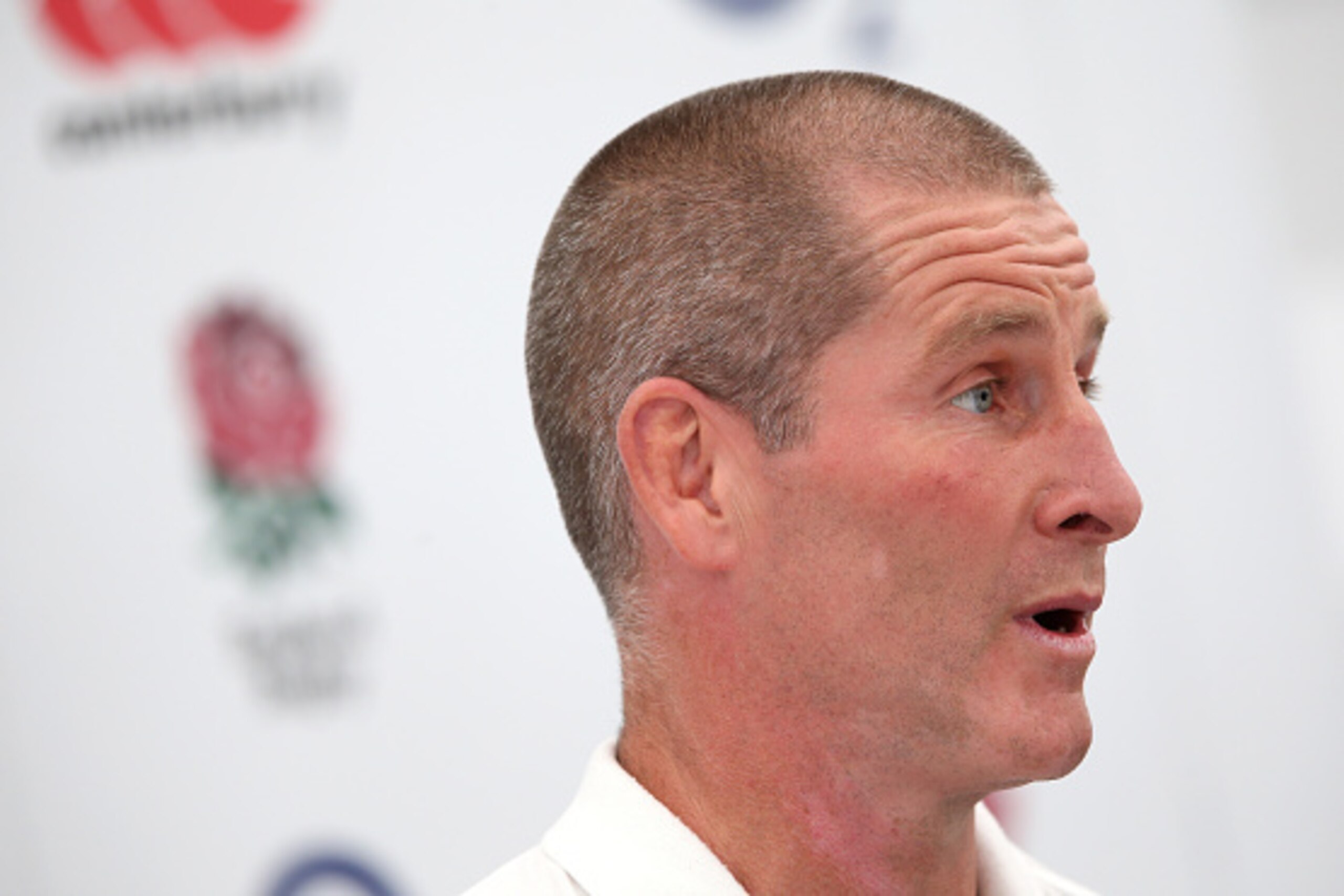 BAGSHOT, ENGLAND - AUGUST 18:  Stuart Lancaster, the England head coach talks to the media during the England media  session held at Pennyhill Park on August 18, 2015 in Bagshot, England.  (Photo by David Rogers/Getty Images)