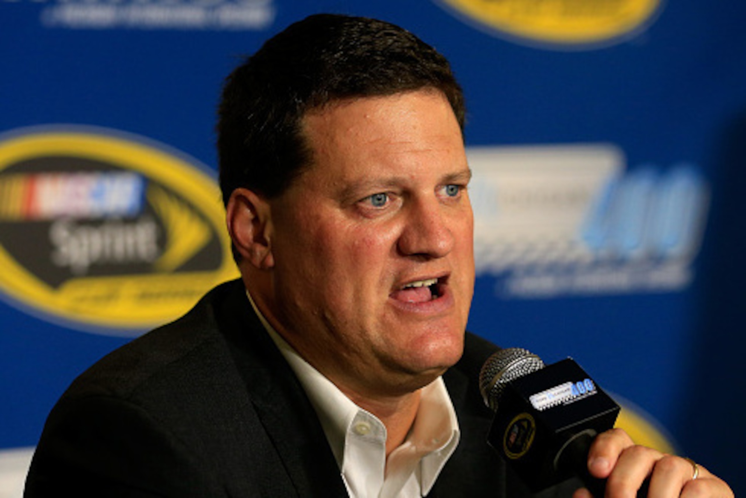 BROOKLYN, MI - AUGUST 14:  NASCAR Executive Vice President Steve O'Donnell speaks to the media after qualifying for the NASCAR Sprint Cup Series Pure Michigan 400 at Michigan International Speedway on August 14, 2015 in Brooklyn, Michigan.  (Photo by Chri