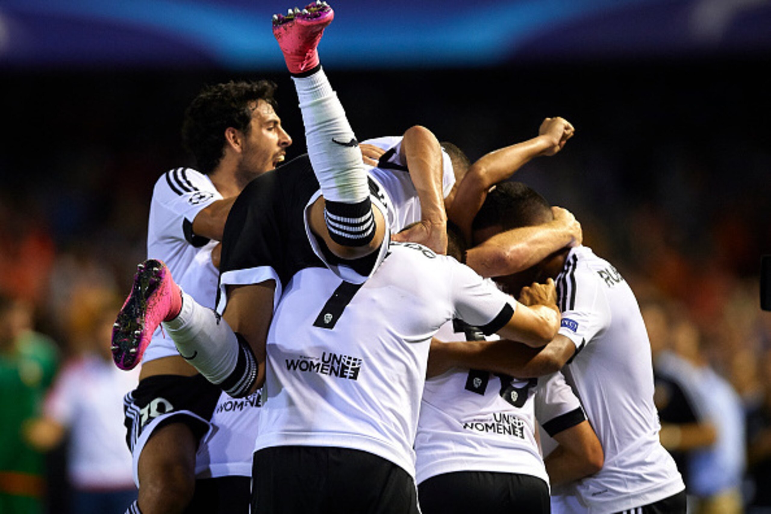 VALENCIA, SPAIN - AUGUST 19: Valencia players celebrate the third goal with during the UEFA Champions League Qualifying Round Play Off First Leg match between Valencia CF and AS Monaco at Mestalla Stadium on August 19, 2015 in Valencia, Spain.  (Photo by 