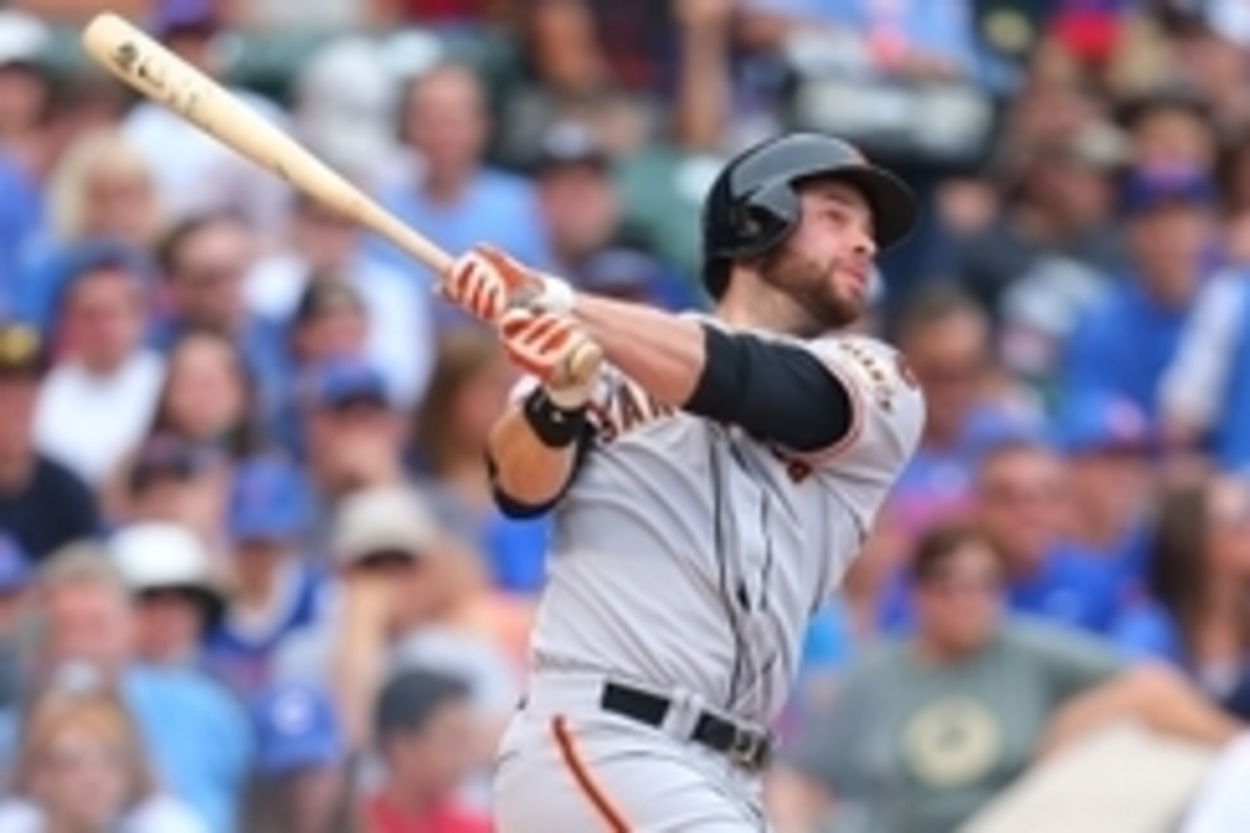 Aug 8, 2015; Chicago, IL, USA; San Francisco Giants first baseman Brandon Belt (9) hits a 2 RBI home run during the second inning against the Chicago Cubs at Wrigley Field. Mandatory Credit: Dennis Wierzbicki-USA TODAY Sports