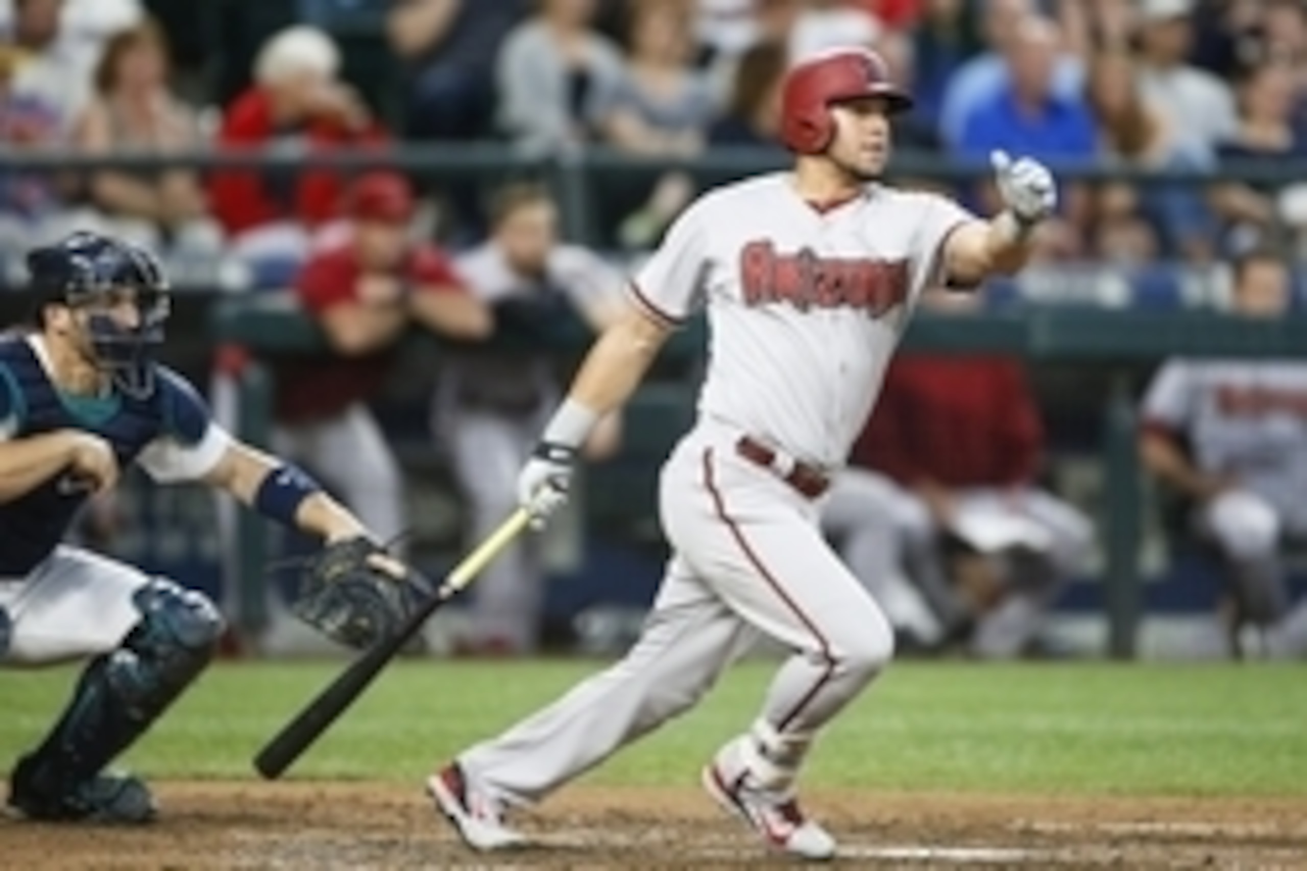 Jul 28, 2015; Seattle, WA, USA; Arizona Diamondbacks left fielder David Peralta (6) singles against the Seattle Mariners during the sixth inning at Safeco Field. Mandatory Credit: Joe Nicholson-USA TODAY Sports