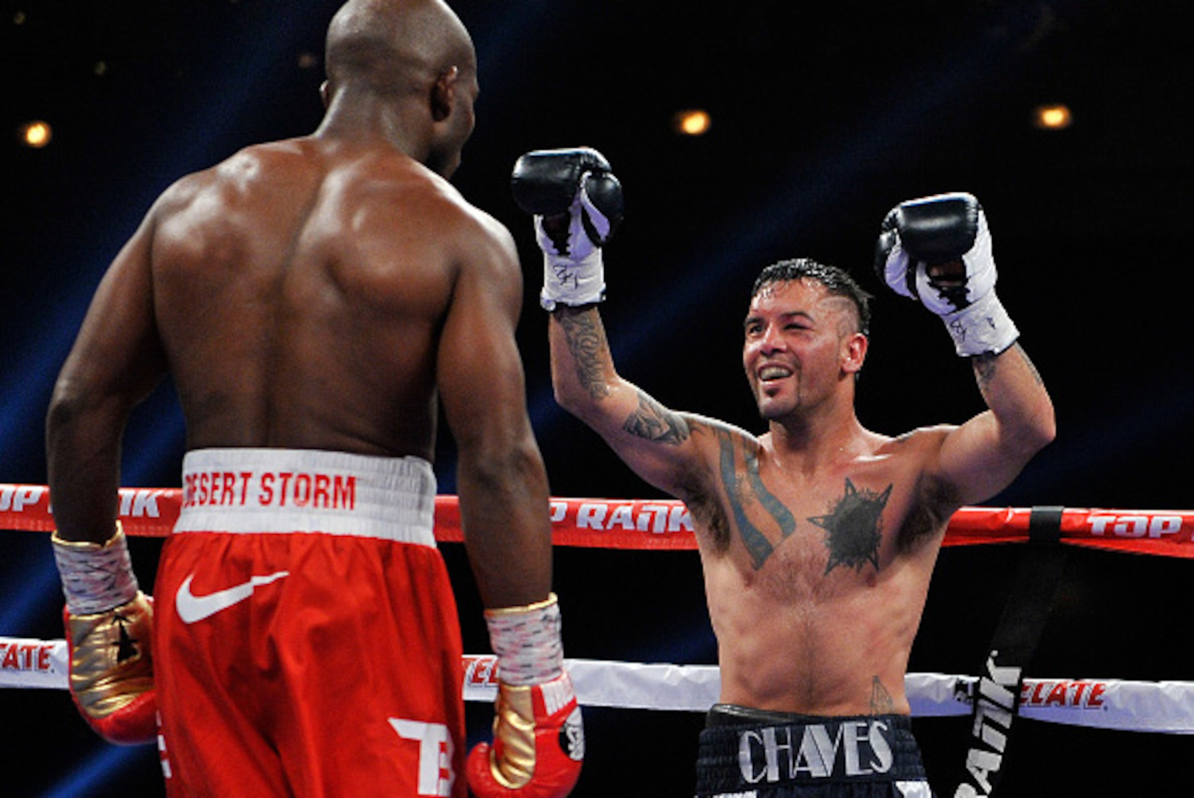 LAS VEGAS, NV - DECEMBER 13:  Diego Chaves (R) reacts at the end of the his welterweight bout with Timothy Bradley Jr. at The Chelsea at The Cosmopolitan of Las Vegas on December 13, 2014 in Las Vegas, Nevada. The the 12-round fight ended in a draw. (Phot
