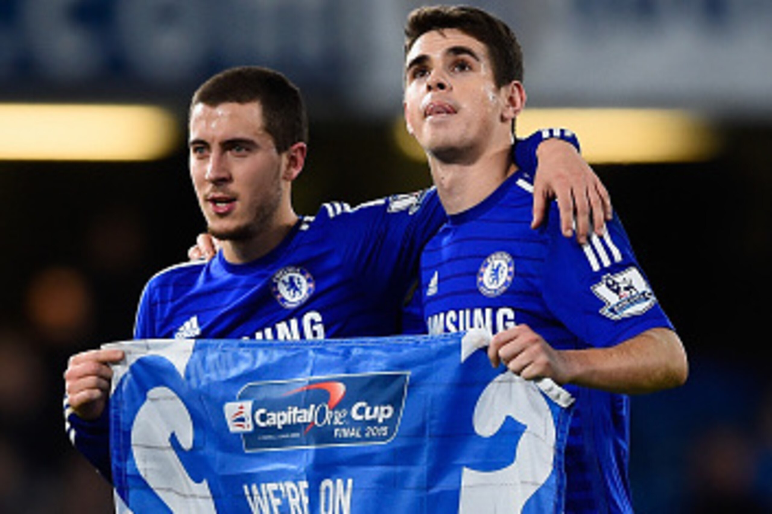 LONDON, ENGLAND - JANUARY 27:  Eden Hazard and Oscar of Chelsea celebrate victory after the Capital One Cup Semi-Final second leg between Chelsea and Liverpool at Stamford Bridge on January 27, 2015 in London, England.  (Photo by Mike Hewitt/Getty Images)