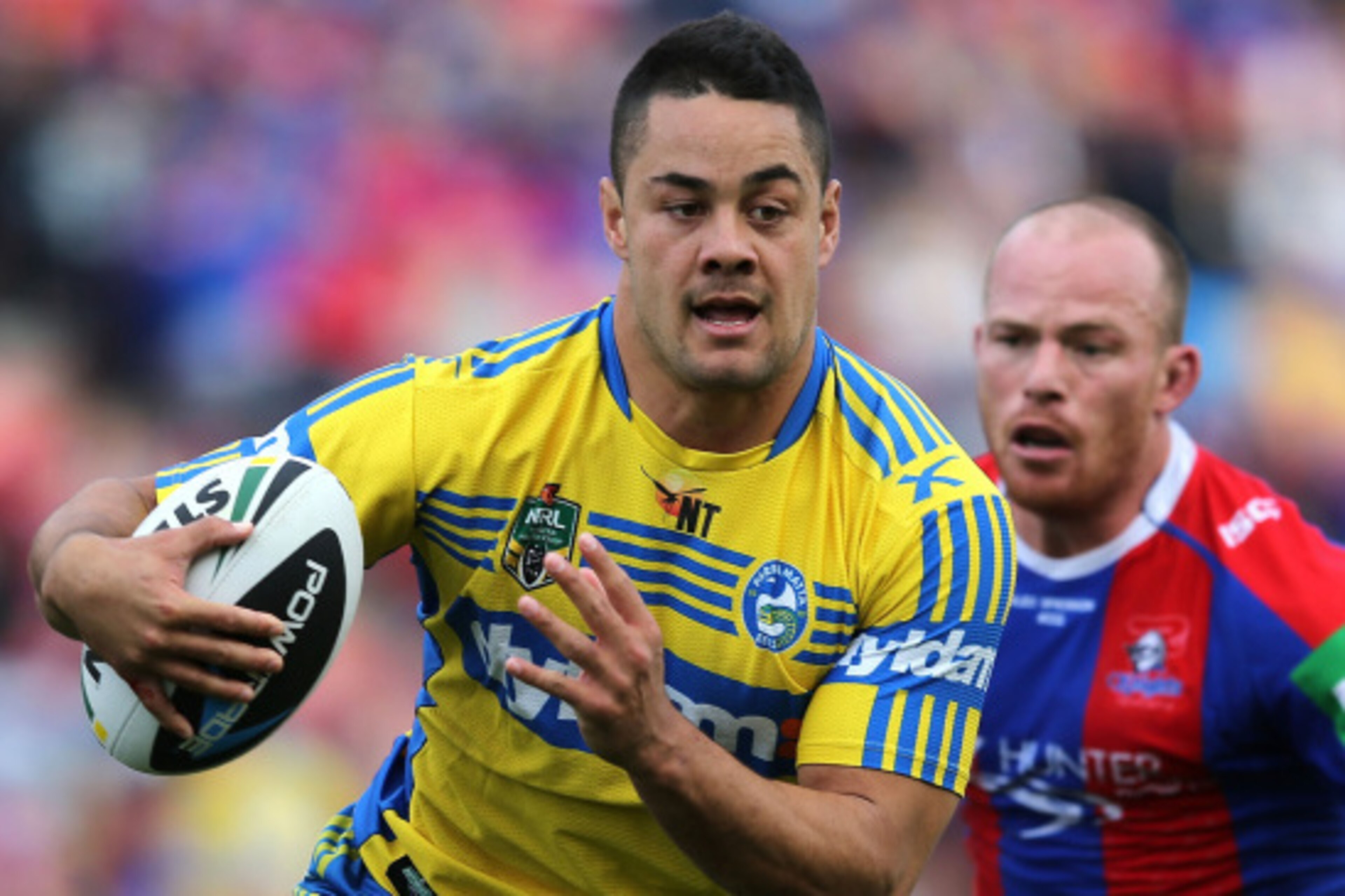 NEWCASTLE, AUSTRALIA - AUGUST 30: Jarryd Hayne of the Eels in action during the round 25 NRL match between the Newcastle Knights and the Parramatta Eels at Hunter Stadium on August 30, 2014 in Newcastle, Australia.  (Photo by Ashley Feder/Getty Images)