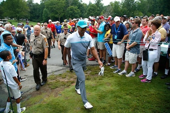 GREENSBORO, NC - AUGUST 20:  Tiger Woods walks up to the eighth tee during the first round of the Wyndham Championship at Sedgefield Country Club on August 20, 2015 in Greensboro, North Carolina.  (Photo by Kevin C. Cox/Getty Images)