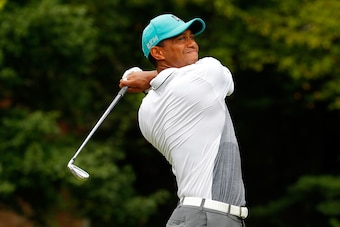 GREENSBORO, NC - AUGUST 20:  Tiger Woods tees off the eighth hole during the first round of the Wyndham Championship at Sedgefield Country Club on August 20, 2015 in Greensboro, North Carolina.  (Photo by Kevin C. Cox/Getty Images)