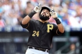 Aug 16, 2015; New York City, NY, USA; Pittsburgh Pirates first baseman Pedro Alvarez (24) celebrates after hitting a solo home run against the New York Mets during the second inning at Citi Field. Mandatory Credit: Adam Hunger-USA TODAY Sports