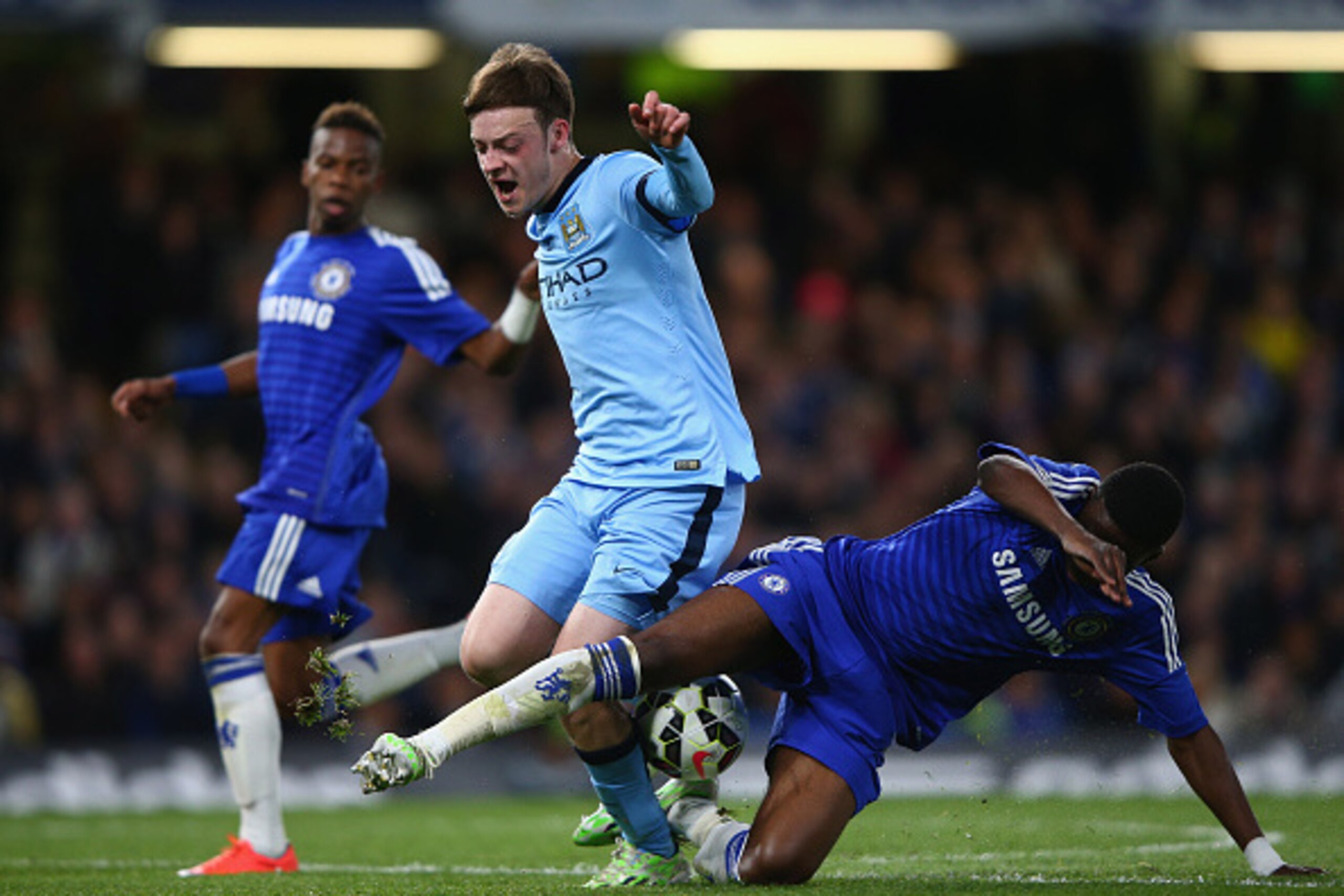 LONDON, ENGLAND - APRIL 27:  Brandon Barker of  Manchester City is Tackled by Fikayo Tomori of Chelsea during the FA Youth Cup Fina, Second Leg match between Chelsea and Manchester City at Stamford Bridge on April 27, 2015 in London, England.  (Photo by I