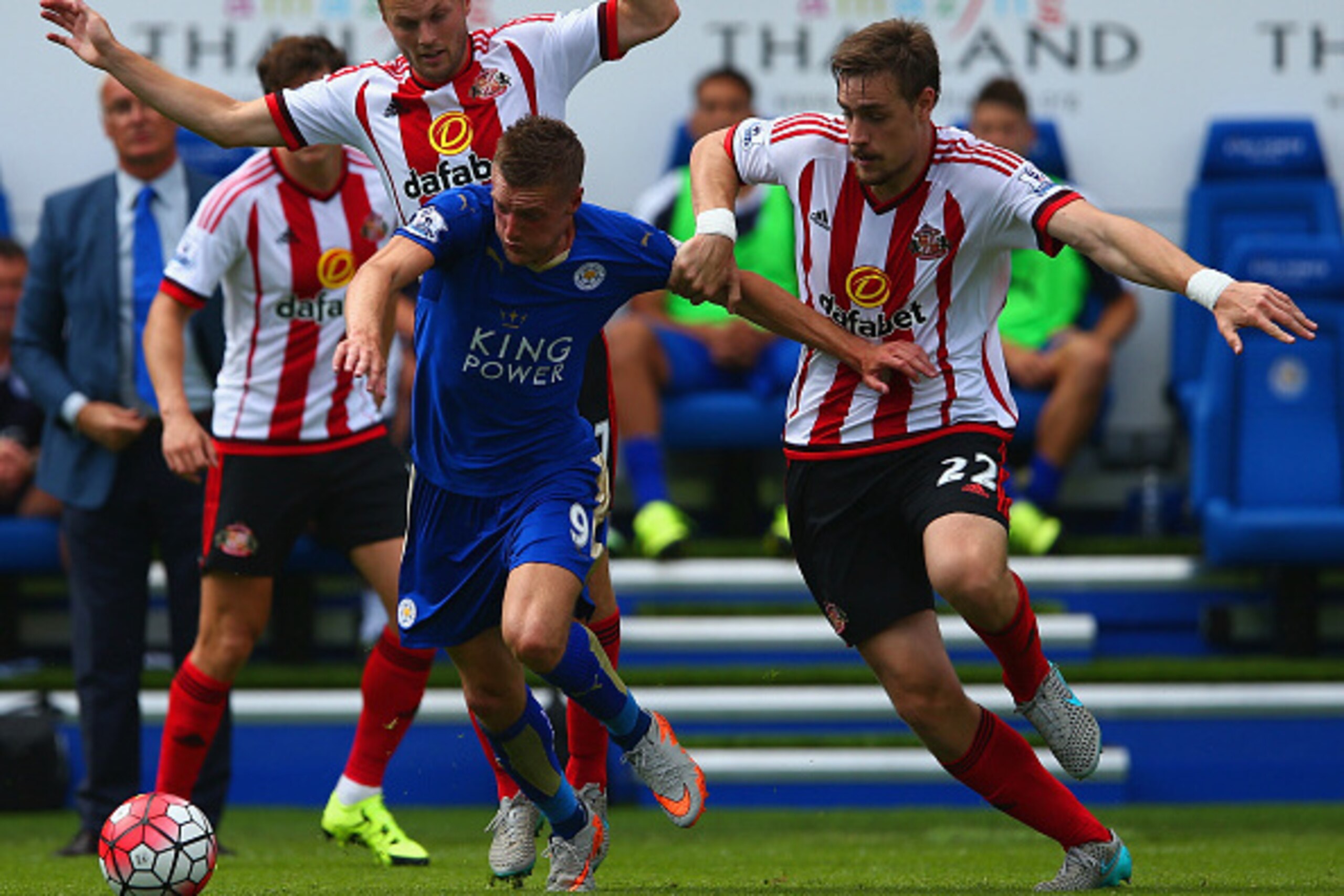 LEICESTER, ENGLAND - AUGUST 08: Jamie Vardy of Leicester City and Sebastian Coates of Sunderland compete for the ball  during the Barclays Premier League match between Leicester City and Sunderland at The King Power Stadium on August 8, 2015 in Leicester,