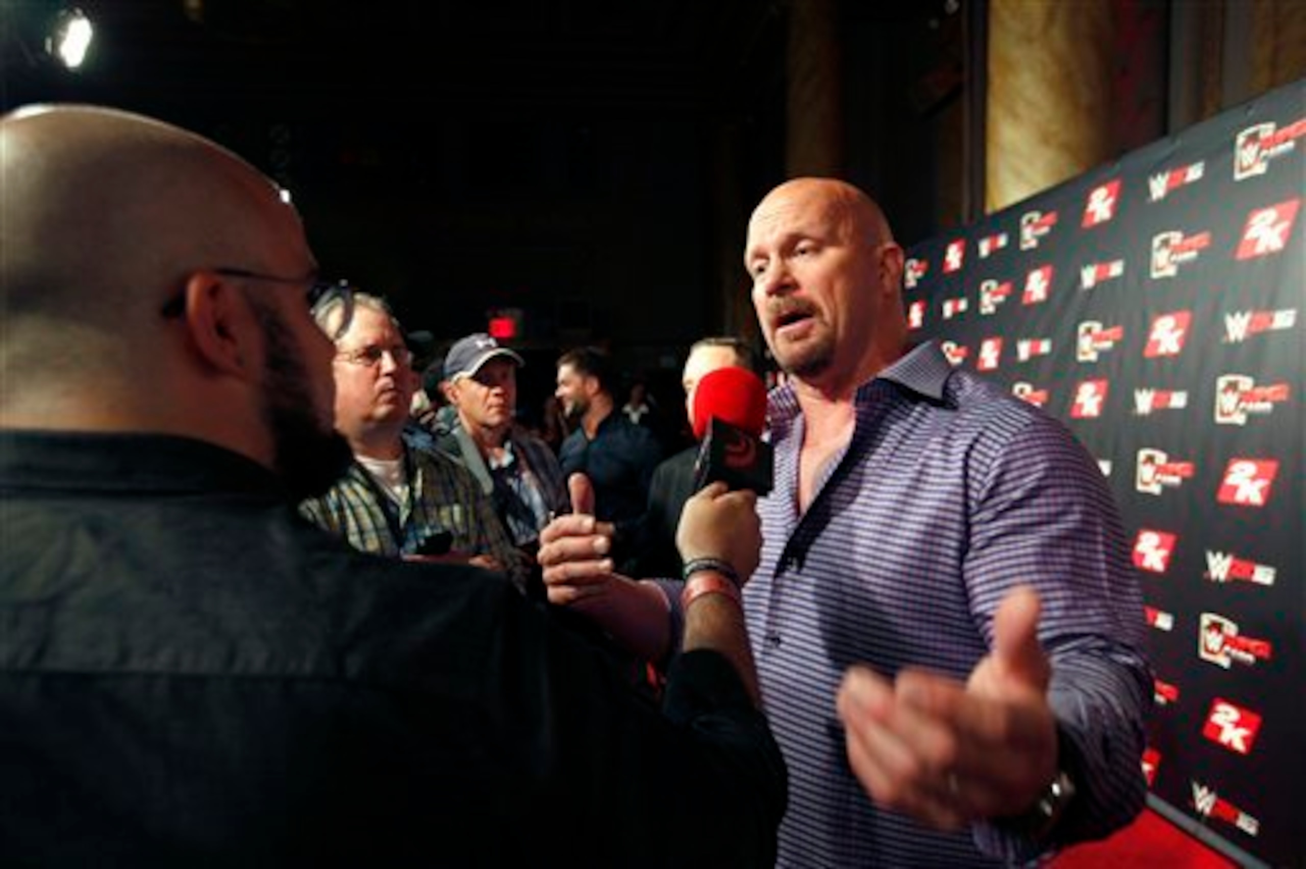 Steve Austin at a WWE 2K16 event. Steve Austin at a WWE 2K16 event.