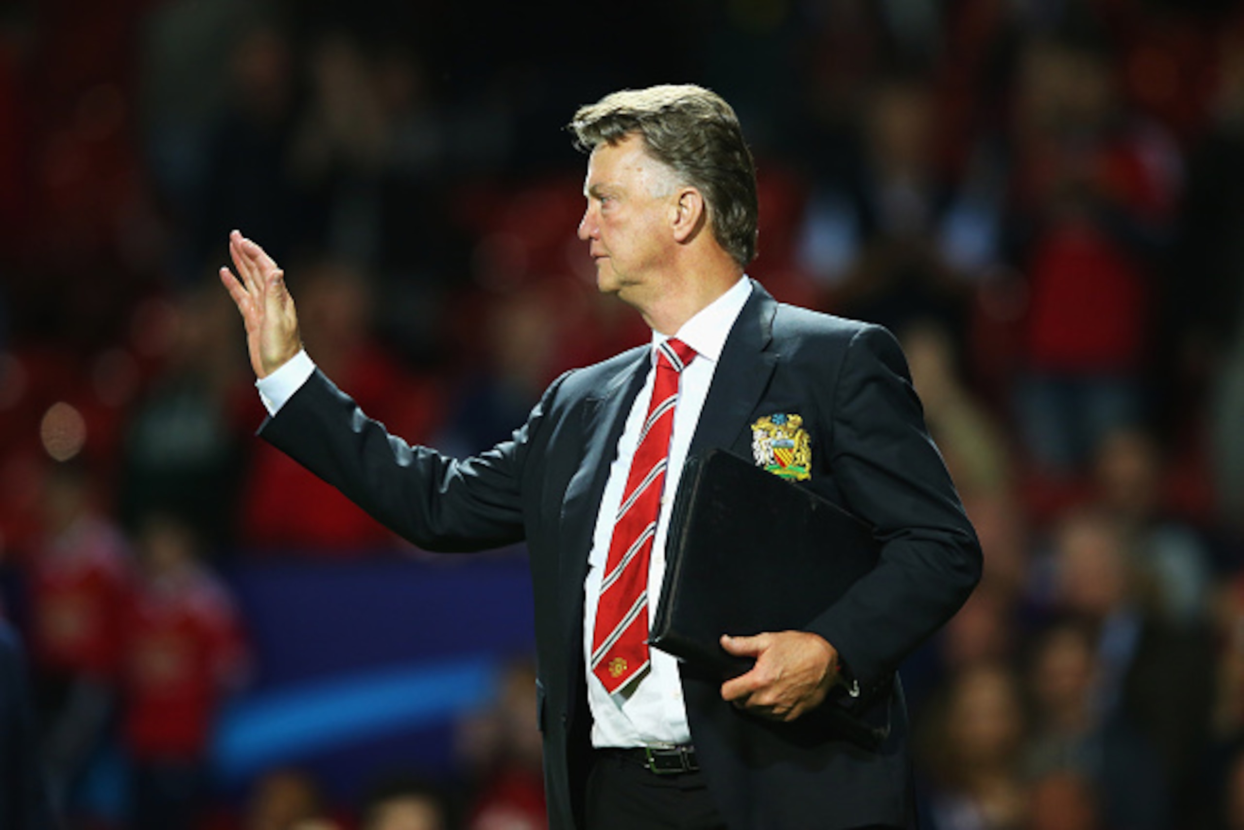 MANCHESTER, ENGLAND - AUGUST 18:  Louis van Gaal, manager of Manchester United celebrates victory after the UEFA Champions League Qualifying Round Play Off First Leg match between Manchester United and Club Brugge at Old Trafford on August 18, 2015 in Man