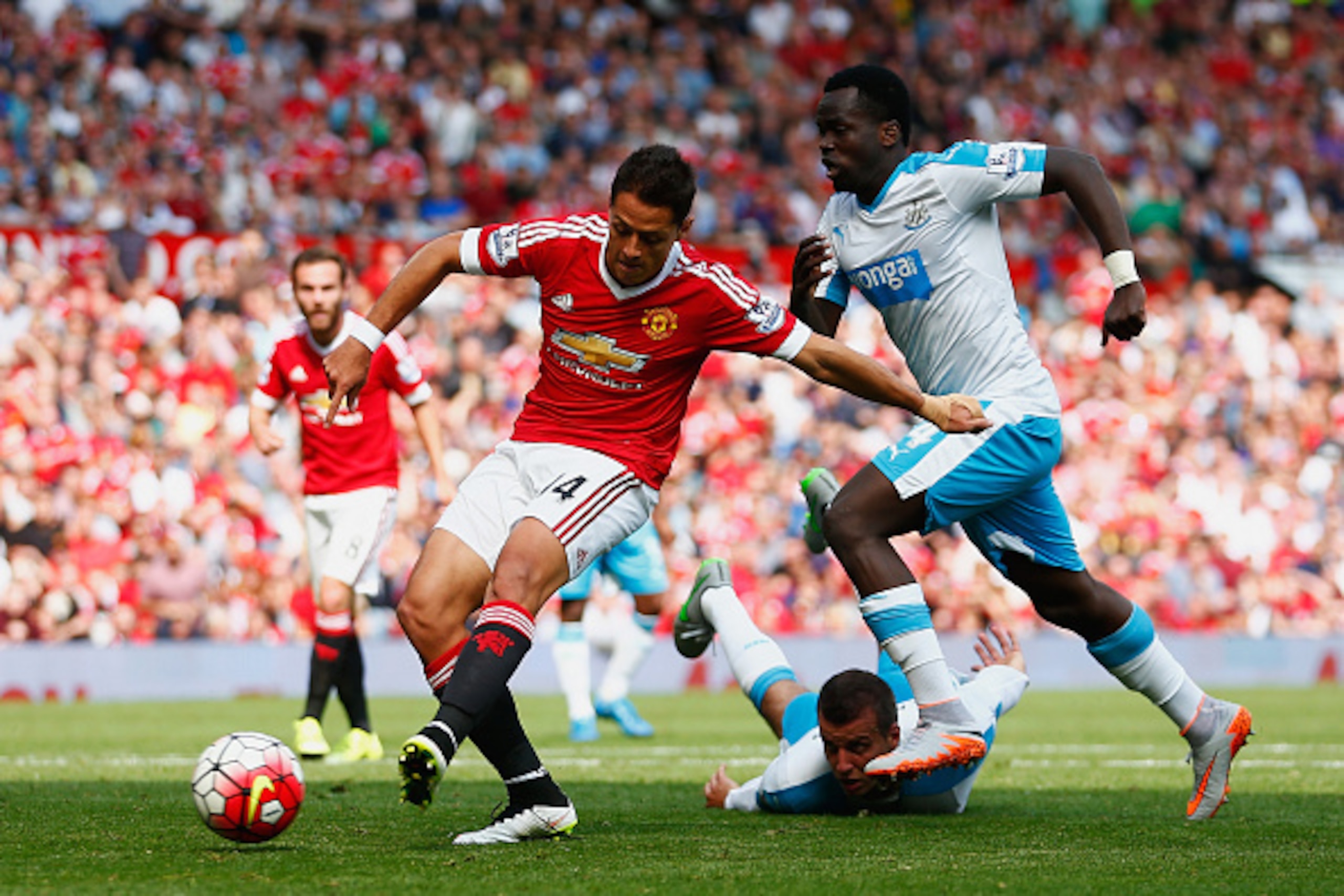 MANCHESTER, ENGLAND - AUGUST 22:  Javier Hernandez of Manchester United shoots at goal during the Barclays Premier League match between Manchester United and Newcastle United at Old Trafford on August 22, 2015 in Manchester, England.  (Photo by Julian Fin