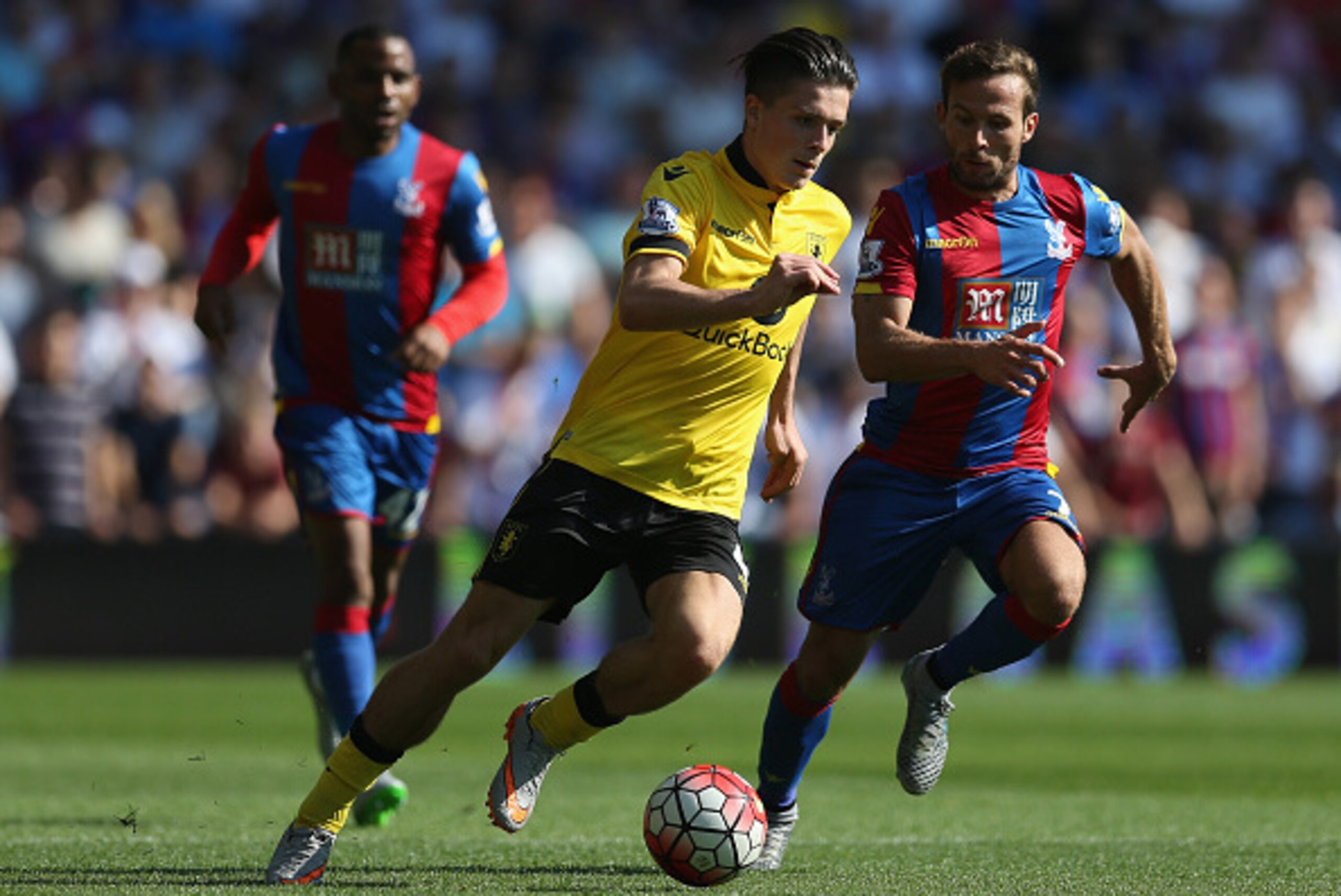LONDON, ENGLAND - AUGUST 22: Jack Grealish of Aston Villa and Yohan Cabaye of Crystal Palace compete for the ball during the Barclays Premier League match between Crystal Palace and Aston Villa at Selhurst Park on August 22, 2015 in London, England.  (Pho