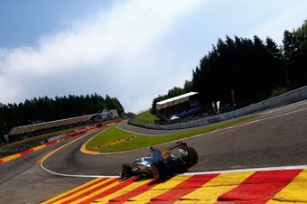 SPA, BELGIUM - AUGUST 23:  Lewis Hamilton of Great Britain and Mercedes GP drives thru Eau Rouge during practice for the Belgian Grand Prix at Circuit de Spa-Francorchamps on August 23, 2013 in Spa, Belgium.  (Photo by Clive Mason/Getty Images)