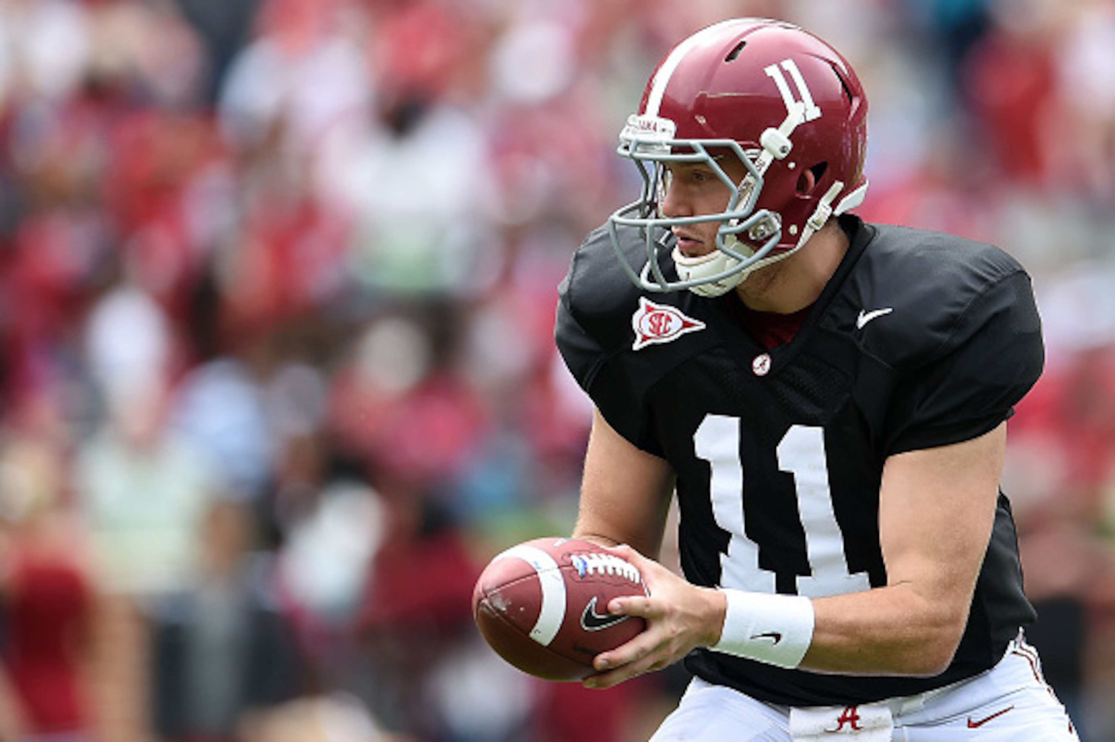 TUSCALOOSA, AL - APRIL 18: Alec Morris #11 of the White team looks to hand the ball off during the University of Alabama Crimson Tide A-day spring game at Bryant-Denny Stadium on April 18, 2015 in Tuscaloosa, Alabama. (Photo by Stacy Revere/Getty Images TUSCALOOSA, AL - APRIL 18: Alec Morris #11 of the White team looks to hand the ball off during the University of Alabama Crimson Tide A-day spring game at Bryant-Denny Stadium on April 18, 2015 in Tuscaloosa, Alabama. (Photo by Stacy Revere/Getty Images