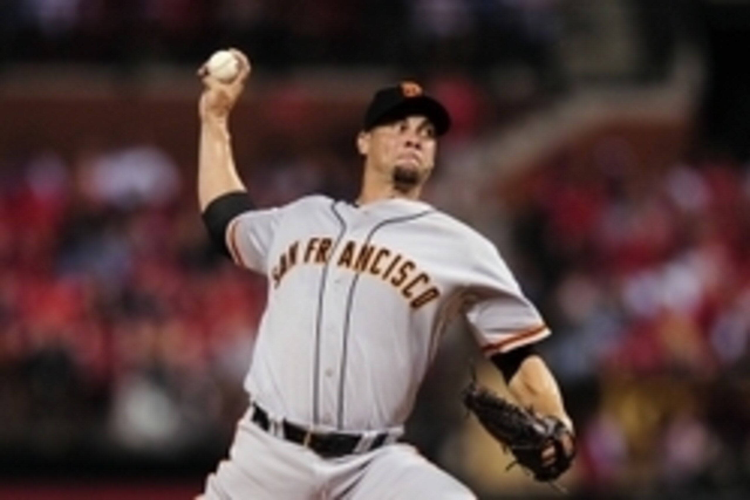 Aug 18, 2015; St. Louis, MO, USA; San Francisco Giants starting pitcher Ryan Vogelsong (32) throws to a St. Louis Cardinals batter during the first inning at Busch Stadium. Mandatory Credit: Jeff Curry-USA TODAY Sports