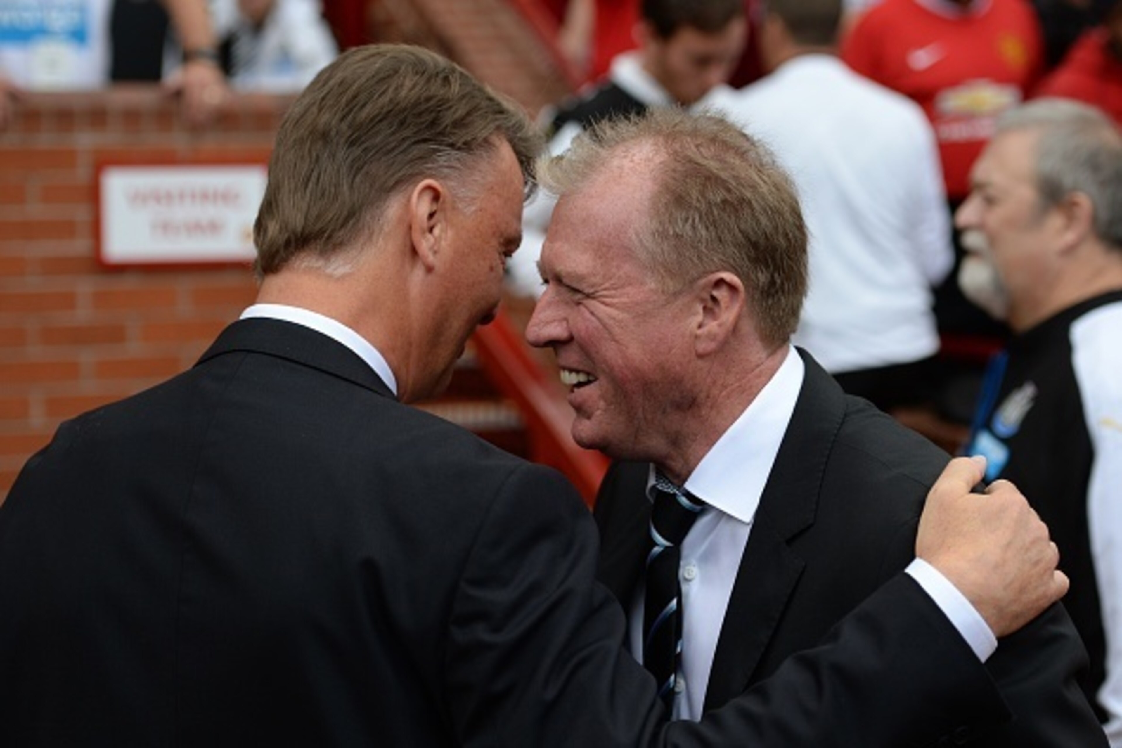 Manchester United's Dutch manager Louis van Gaal (L) greets Newcastle United's English head coach Steve McClaren (R) ahead of the English Premier League football match between Manchester United and Newcastle United at Old Trafford in Manchester, north wes