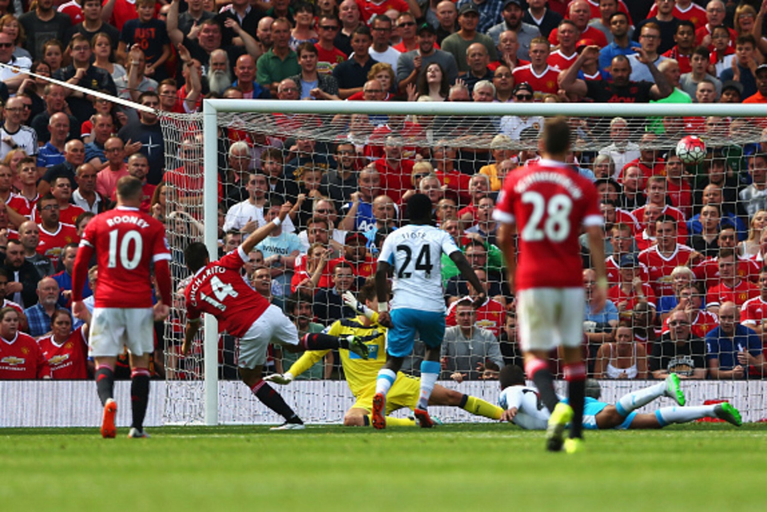 MANCHESTER, ENGLAND - AUGUST 22: Tim Krul of Newcastle United makes a save a shot by Javier Hernandez of Manchester United  during the Barclays Premier League match between Manchester United and Newcastle United at Old Trafford on August 22, 2015 in Manch