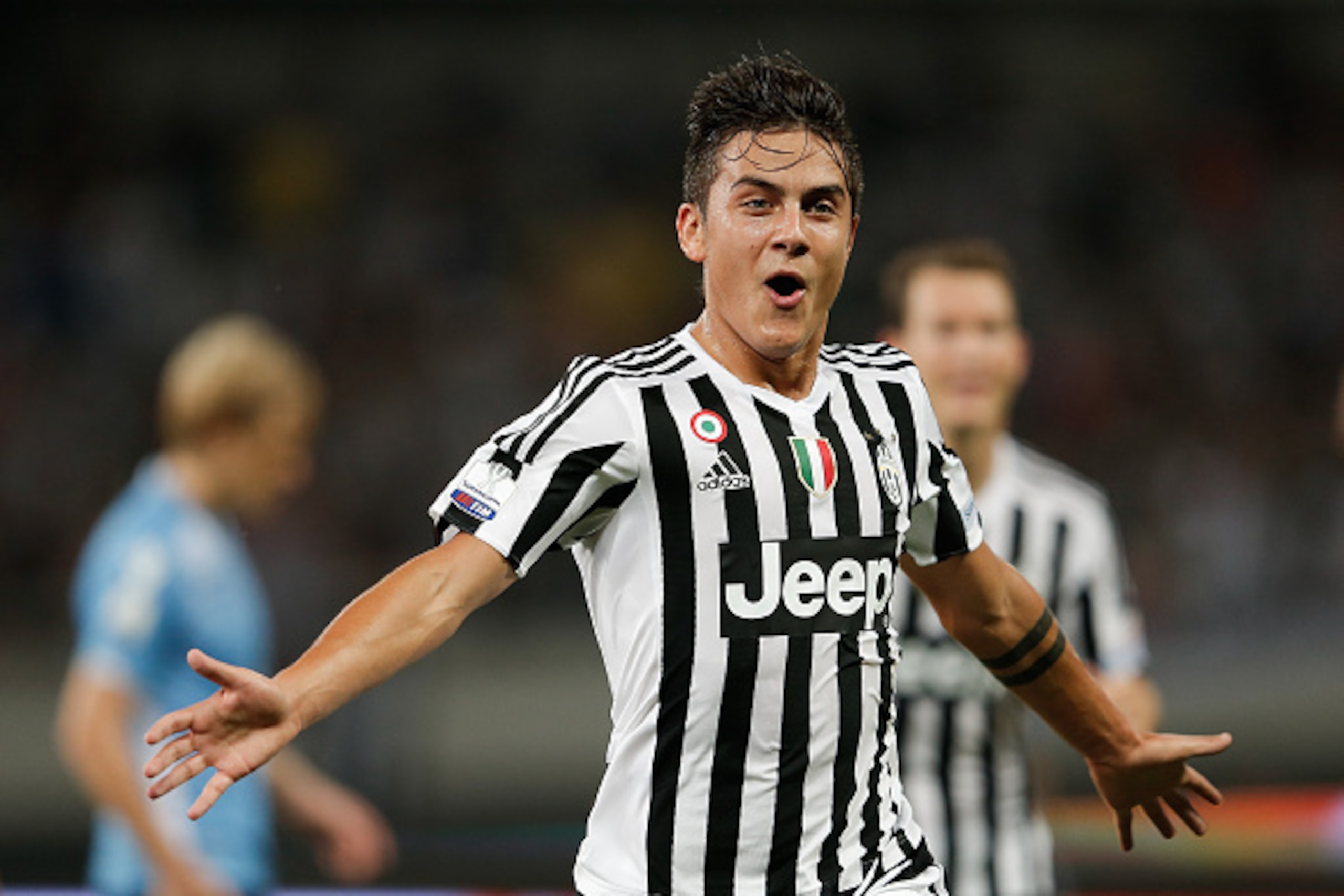SHANGHAI, CHINA - AUGUST 08:  Paulo Dybala of Juventus FC in celebrates a goal during the Italian Super Cup final football match between Juventus and Lazio at Shanghai Stadium on August 8, 2015 in Shanghai, China.  (Photo by Lintao Zhang/Getty Images)