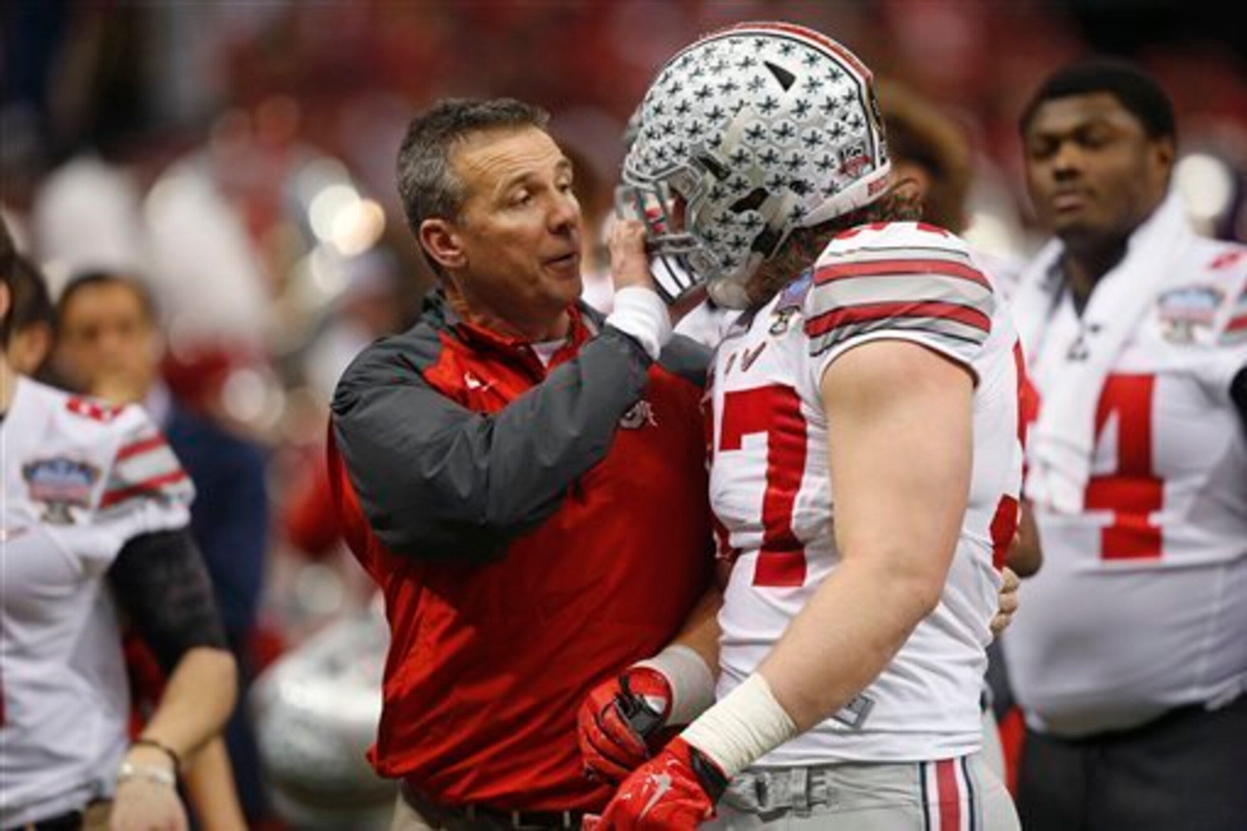 Urban Meyer (left) and Joey Bosa (right). Urban Meyer (left) and Joey Bosa (right).