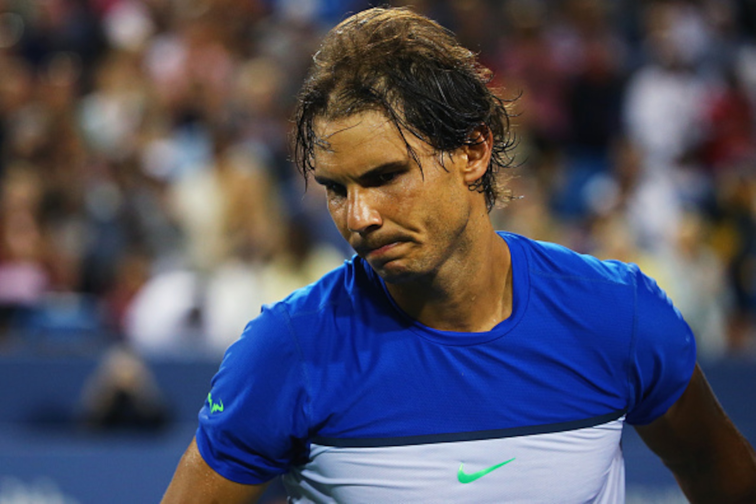 CINCINNATI, OH - AUGUST 20:  Rafael Nadal of Spain reacts after losing his match against Feliciano Lopez of Spain during Day 6 of the Western & Southern Open at the Lindner Family Tennis Center on August 20, 2015 in Cincinnati, Ohio.  (Photo by Maddie Mey