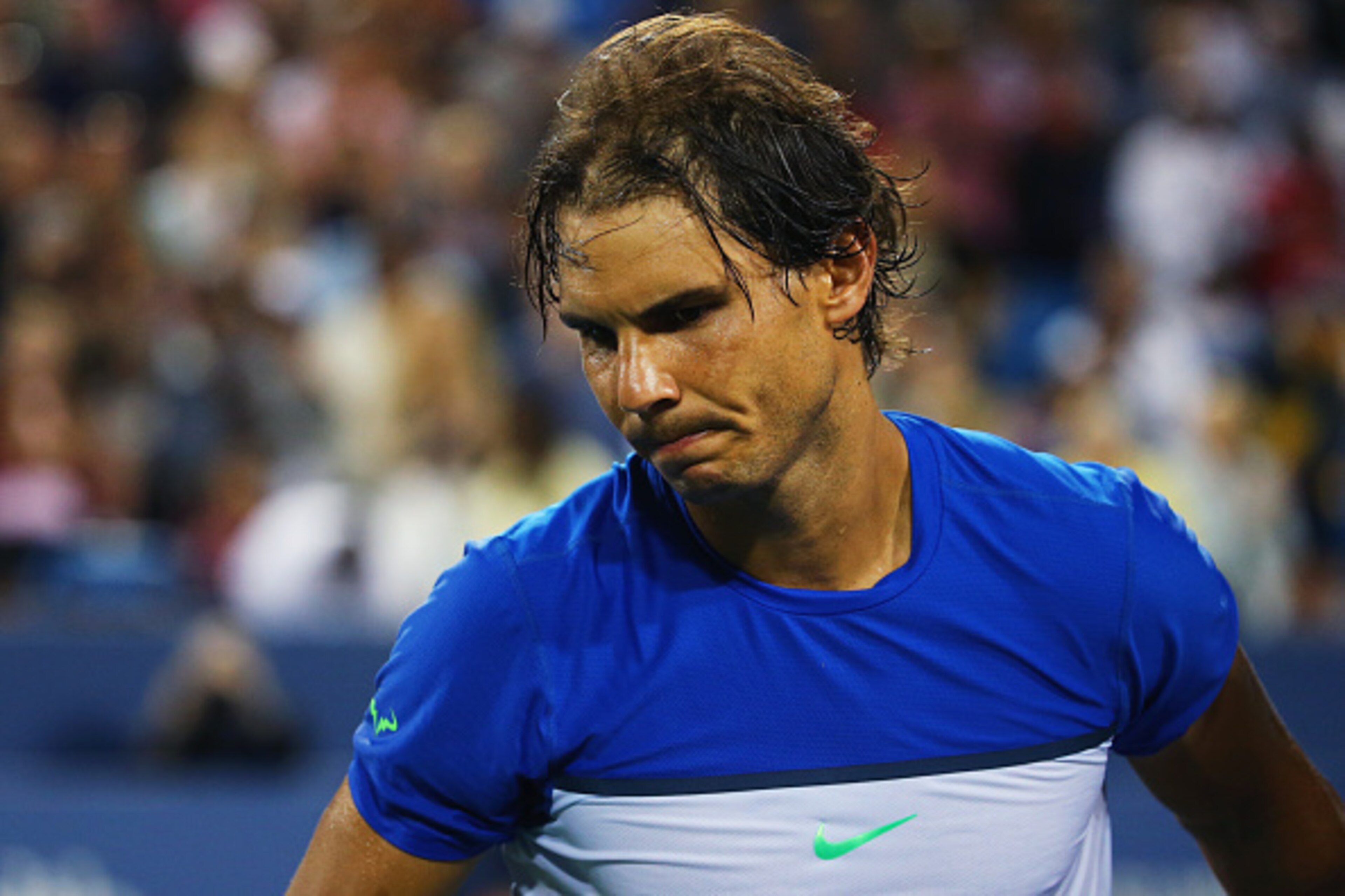 CINCINNATI, OH - AUGUST 20:  Rafael Nadal of Spain reacts after losing his match against Feliciano Lopez of Spain during Day 6 of the Western & Southern Open at the Lindner Family Tennis Center on August 20, 2015 in Cincinnati, Ohio.  (Photo by Maddie Mey