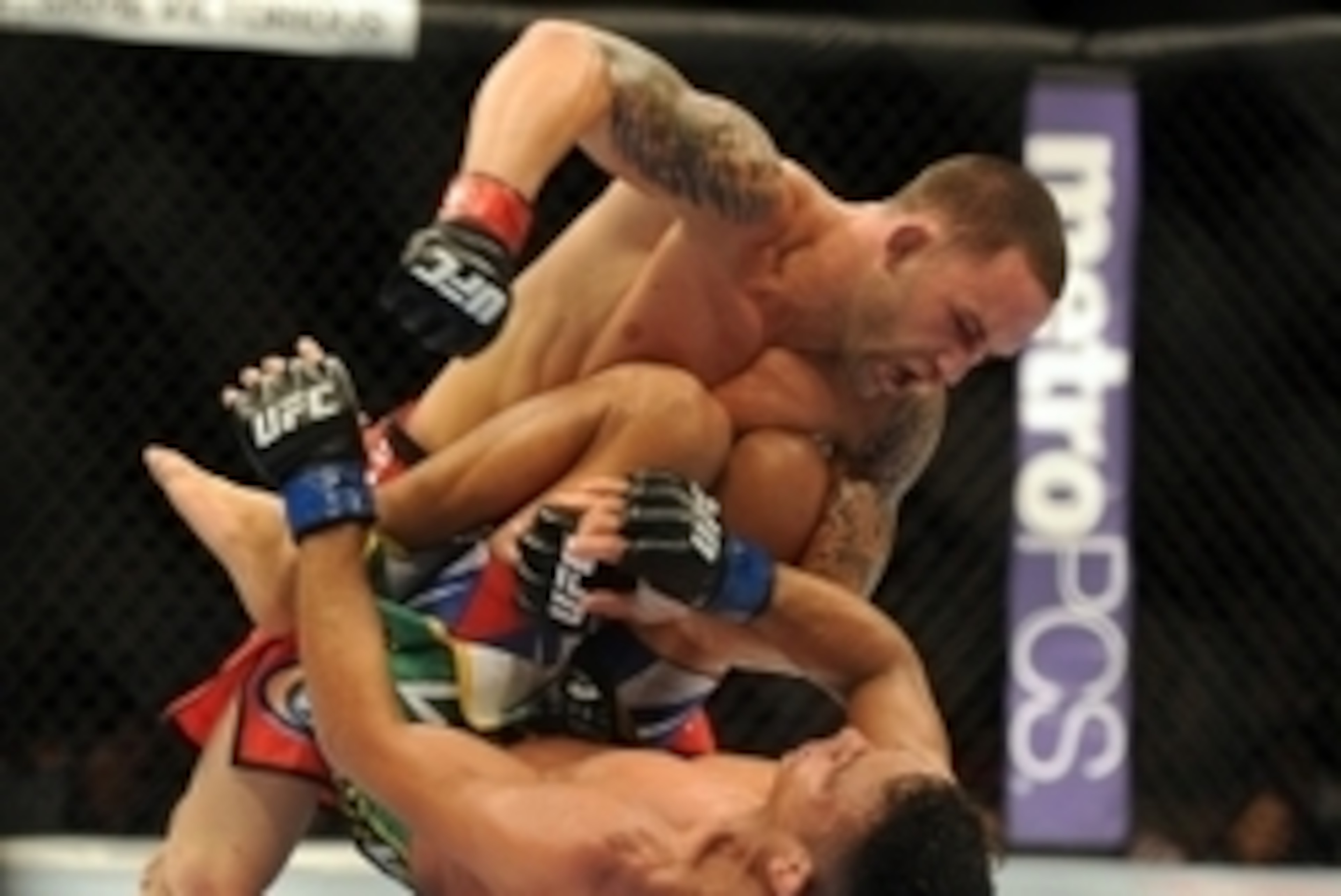 Jul 6, 2013; Las Vegas, NV, USA;  Frankie Edgar and Charles Oliveira during their Featherweight Bout at the MGM Grand Garden Arena. Mandatory Credit: Jayne Kamin-Oncea-USA TODAY Sports