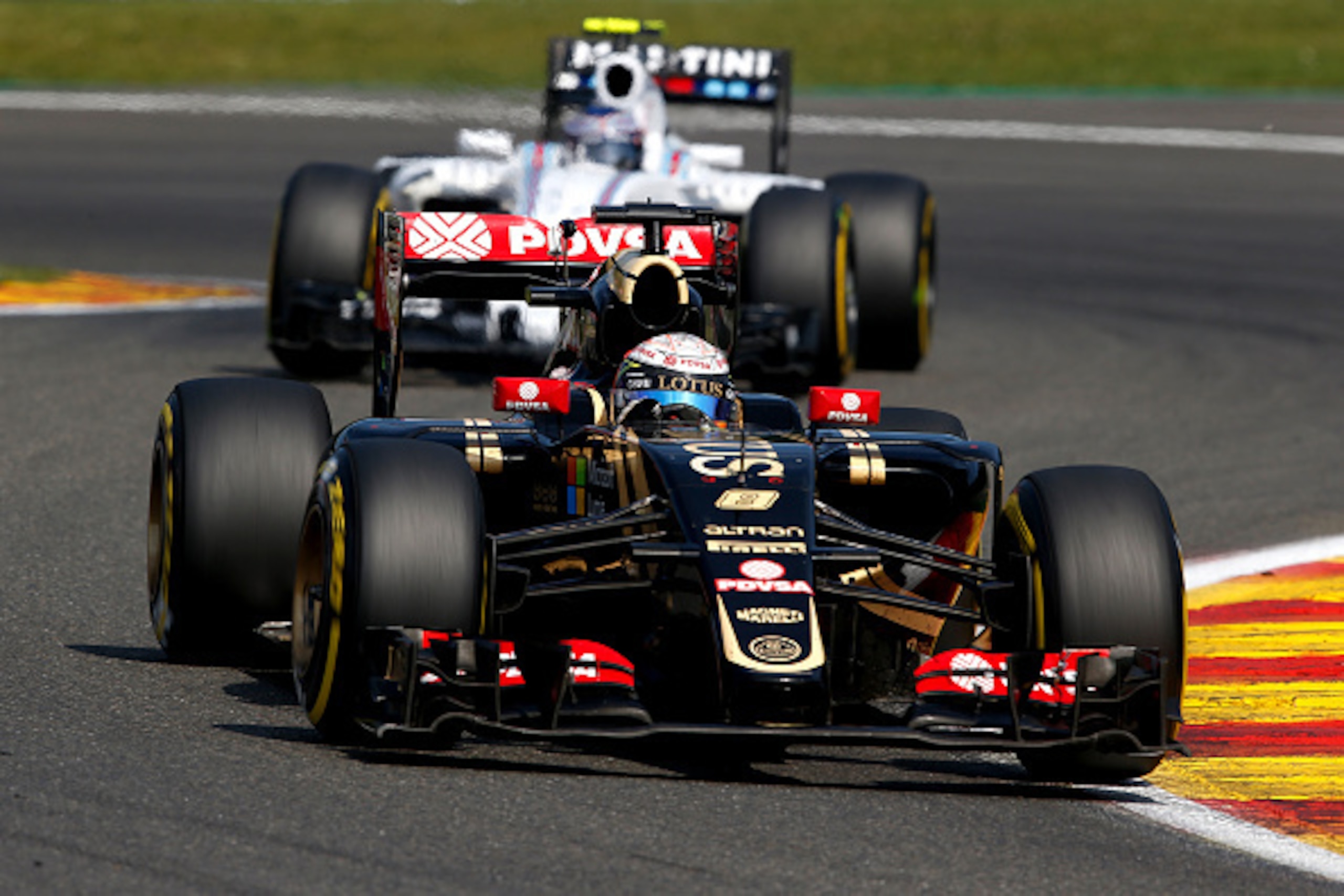 SPA, BELGIUM - AUGUST 23:  Romain Grosjean of France and Lotus drives during the Formula One Grand Prix of Belgium at Circuit de Spa-Francorchamps on August 23, 2015 in Spa, Belgium.  (Photo by Charles Coates/Getty Images)