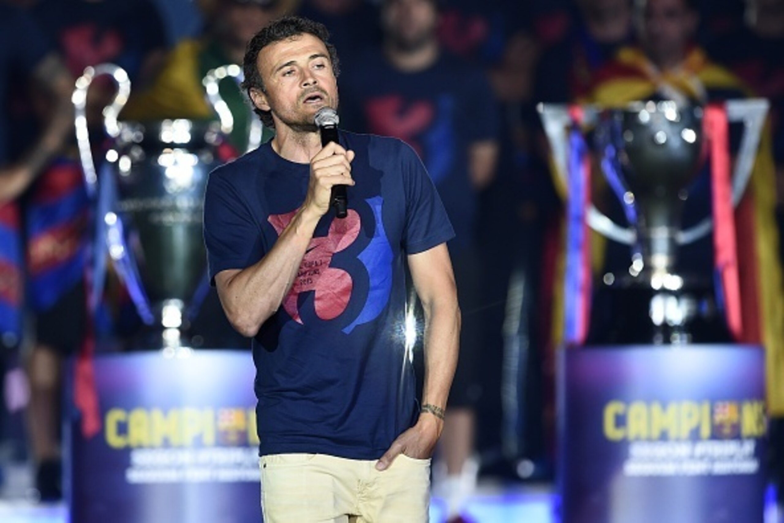 Barcelona's coach Luis Enrique delivers a speech as he takes part in the celebrations held for their victory over Juventus, one day after the UEFA Champions League final football, at the Camp Nou stadium in Barcelona on June 7, 2015. Luis Suarez and Neyma
