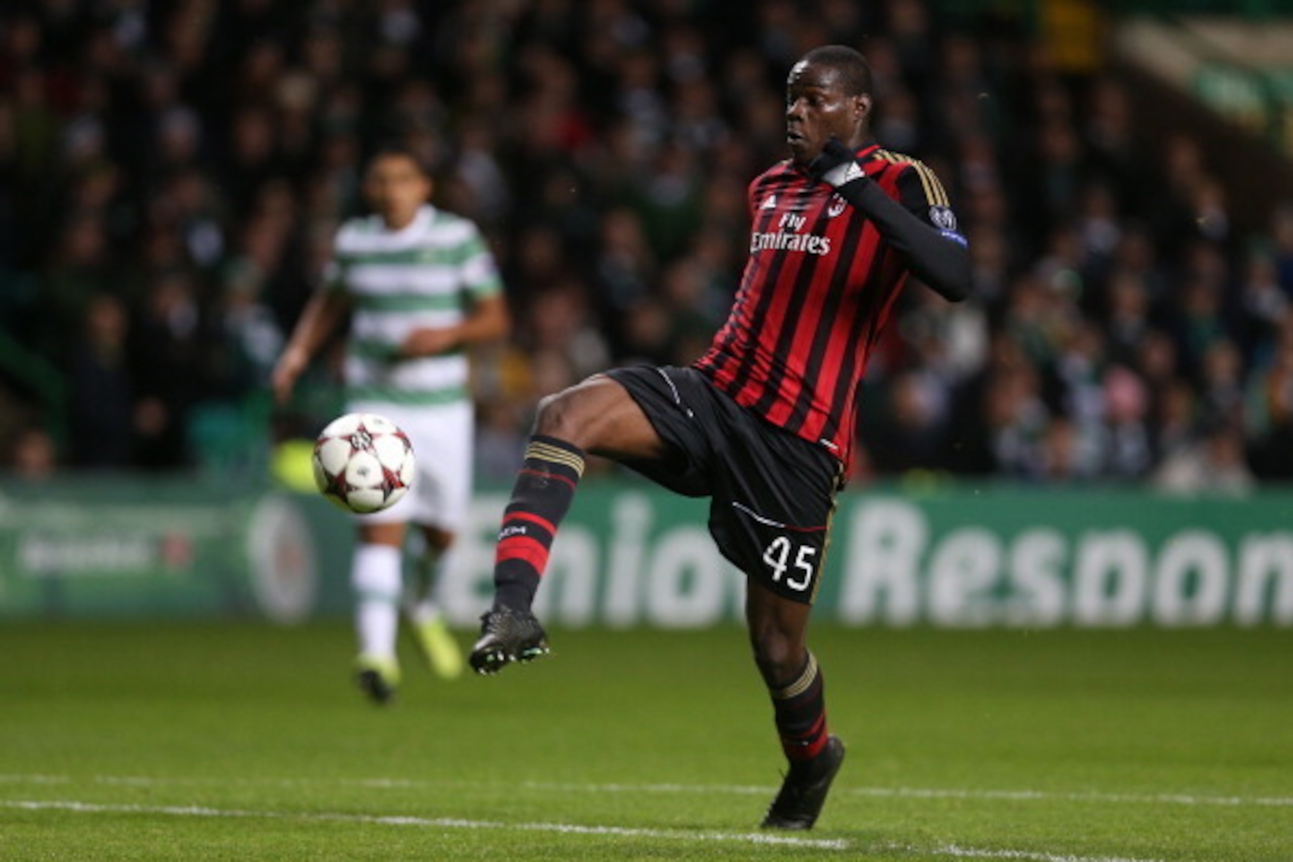 AC Milan's Italian forward Mario Balotelli scores a goal that is disallowed for offside during the UEFA Champions League group H football match between Celtic and AC Milan at Celtic Park in Glasgow on November 26, 2013. AFP PHOTO / IAN MACNICOL        (Ph