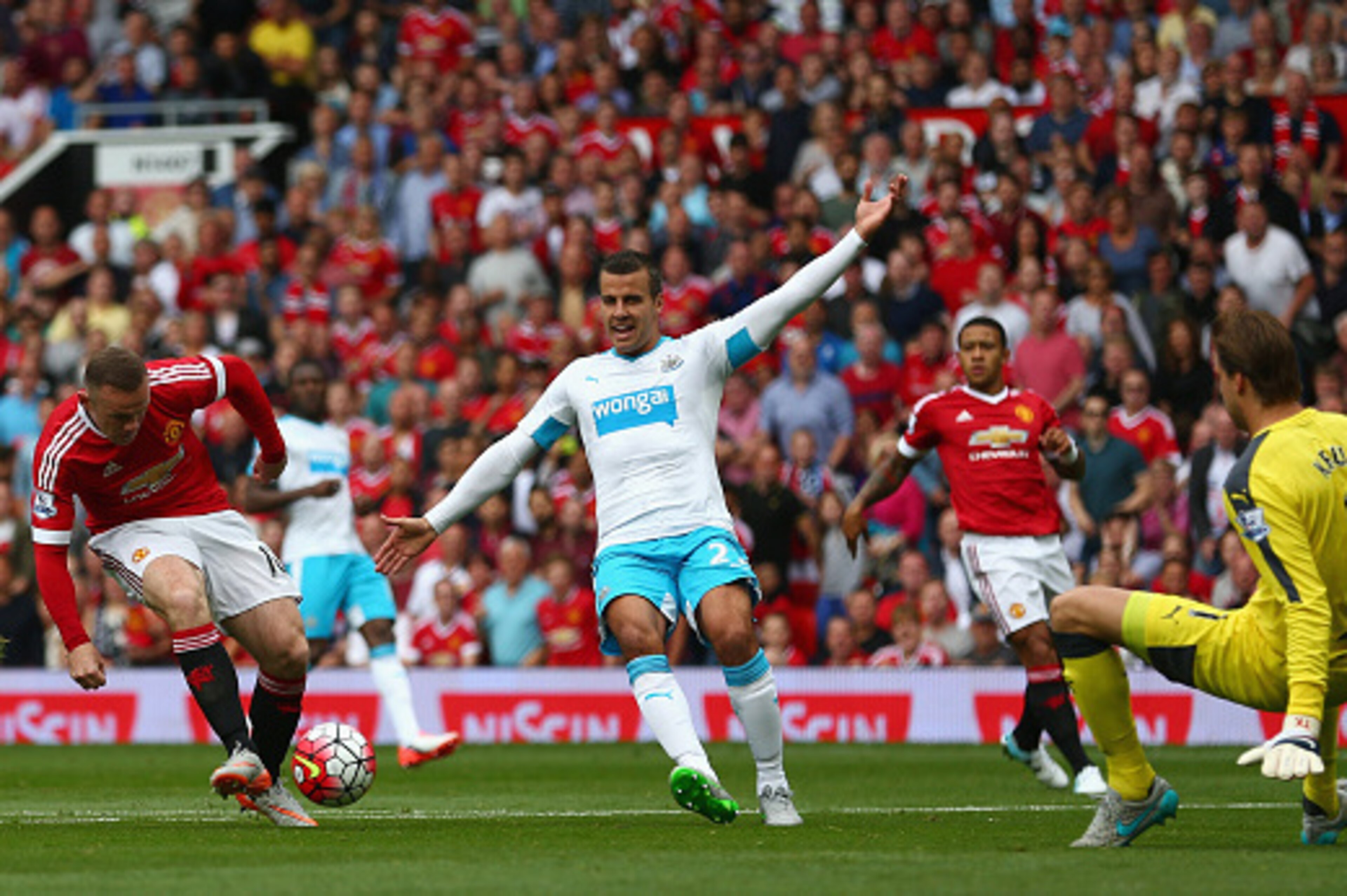 MANCHESTER, ENGLAND - AUGUST 22: Wayne Rooney of Manchester United shoots at goal during the Barclays Premier League match between Manchester United and Newcastle United at Old Trafford on August 22, 2015 in Manchester, England. (Photo by Clive Brunskil MANCHESTER, ENGLAND - AUGUST 22: Wayne Rooney of Manchester United shoots at goal during the Barclays Premier League match between Manchester United and Newcastle United at Old Trafford on August 22, 2015 in Manchester, England. (Photo by Clive Brunskil