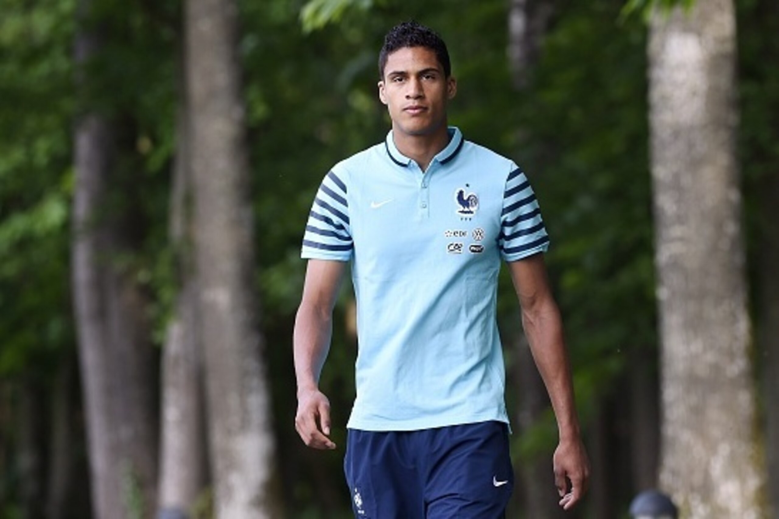 French defender Raphael Varane arrives to take part in a press conference in Clairefontaine-en-Yvelines, near Paris, on June 5, 2015 two days prior to the friendly football match France vs Belgium to be held at the Stade-de-France in Saint-Denis, outside 