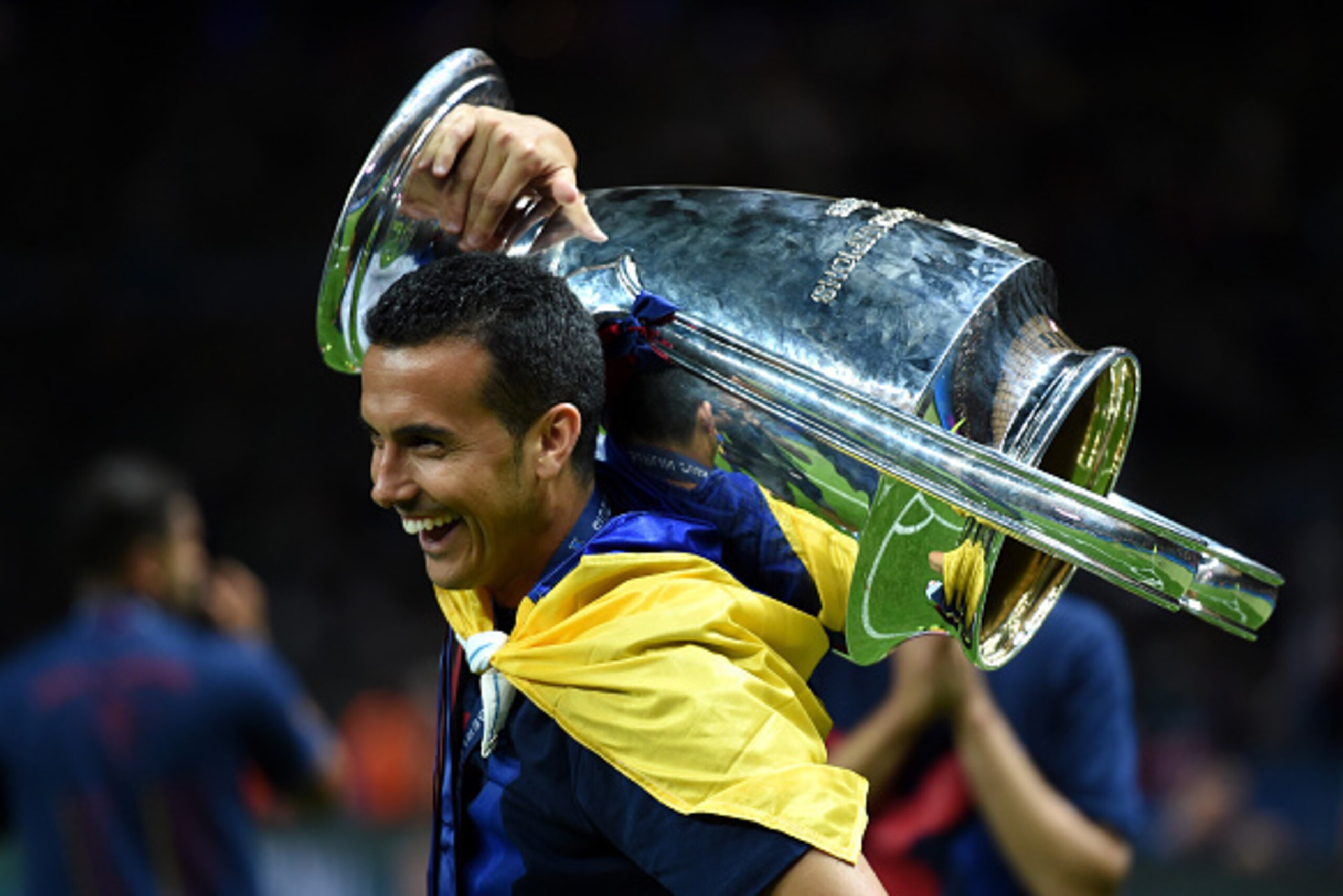 BERLIN, GERMANY - JUNE 06:  Pedro of Barcelona celebrates with the trophy after the UEFA Champions League Final between Juventus and FC Barcelona at Olympiastadion on June 6, 2015 in Berlin, Germany.  (Photo by Matthias Hangst/Getty Images)