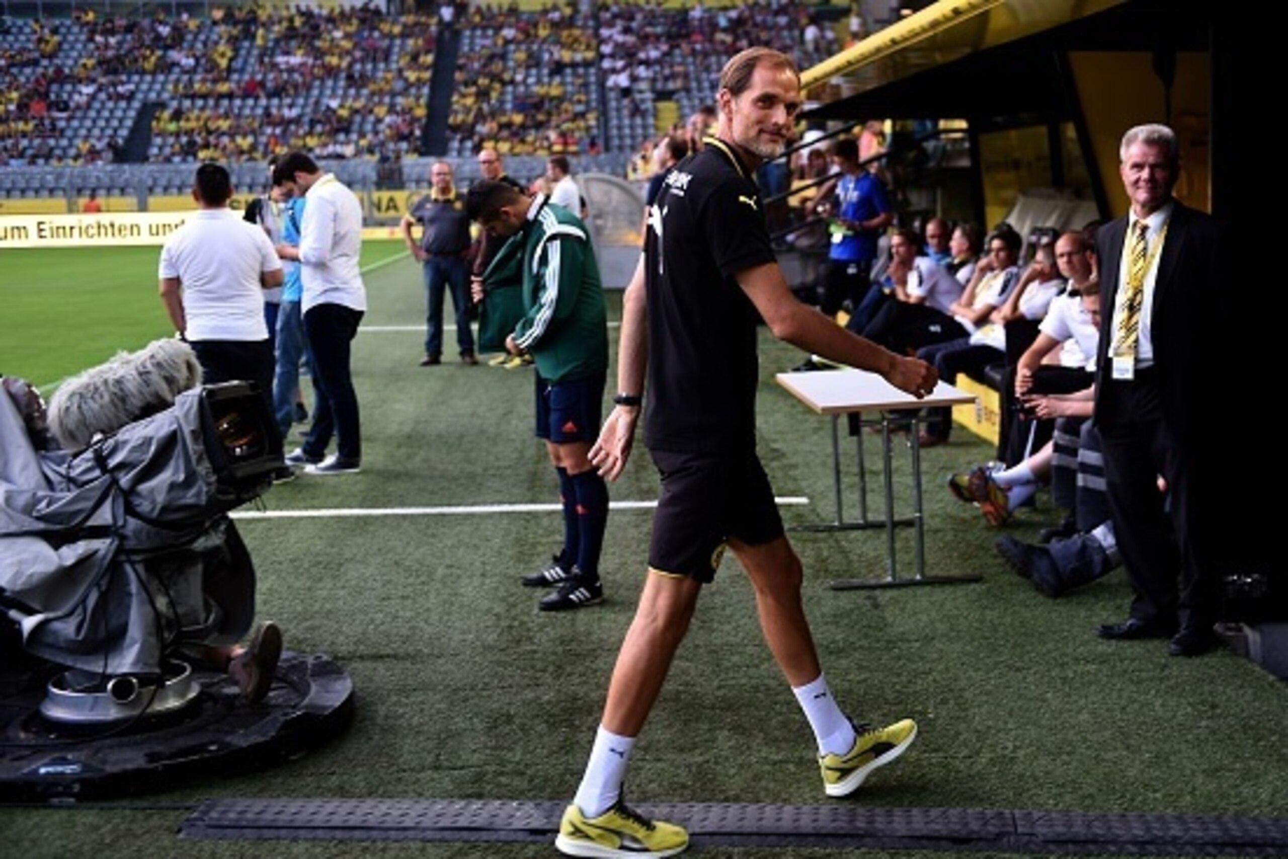 Dortmund's head coach Thomas Tuchel arrives for the UEFA Europa League third qualifying round second leg football match between Dortmund and Wolfsberg on August 6, 2015 in Dortmund, western Germany. AFP PHOTO / PATRIK STOLLARZ        (Photo credit should 