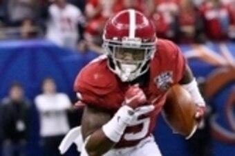 Jan 1, 2015; New Orleans, LA, USA; Alabama Crimson Tide defensive back Cyrus Jones (5) returns an interception against the Alabama Crimson Tide during the first half of the 2015 Sugar Bowl at Mercedes-Benz Superdome. Mandatory Credit: Derick E. Hingle-USA