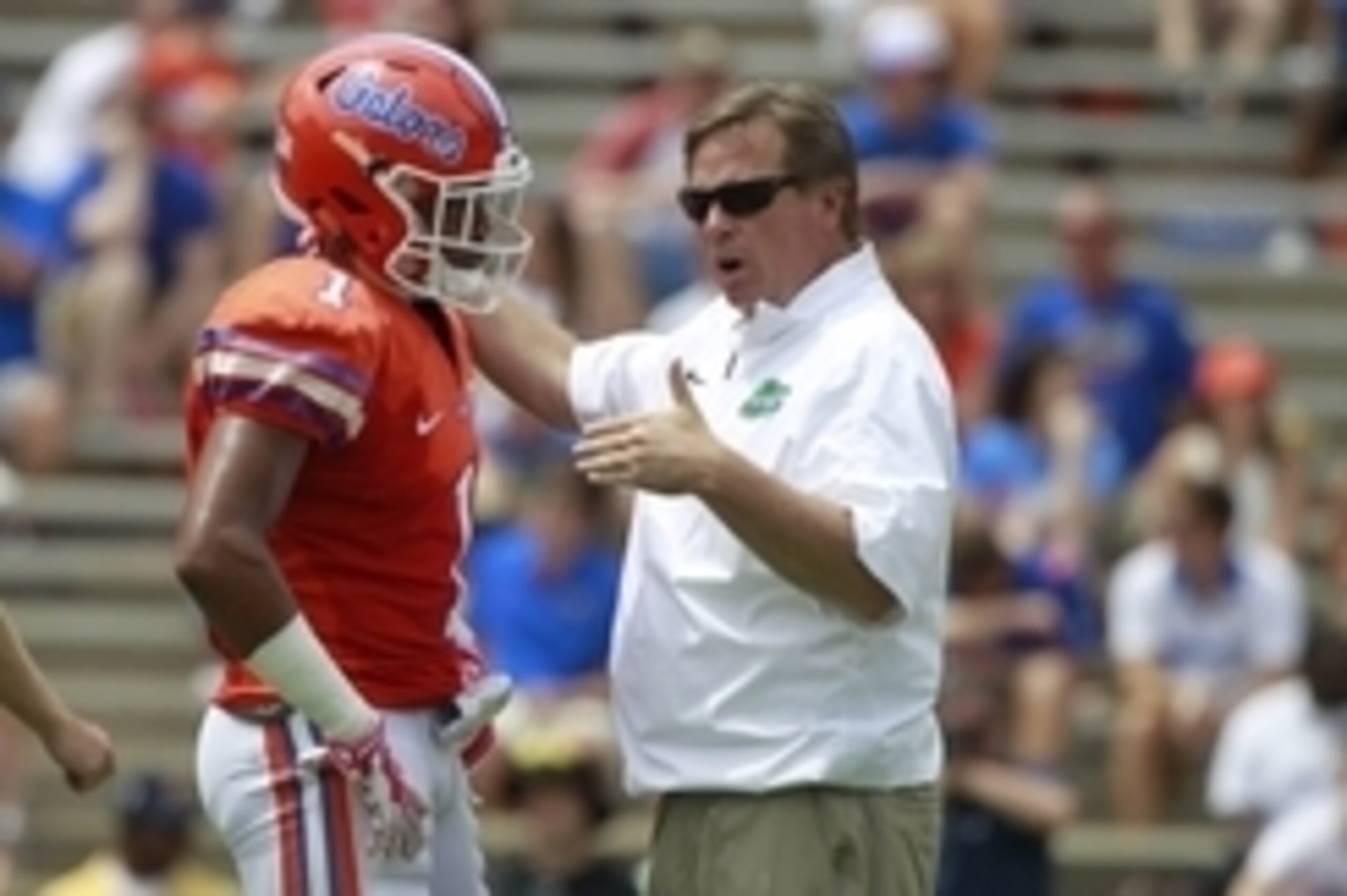 Apr 11, 2015; Gainesville, FL, USA; Florida Gators head coach Jim McElwain talks with defensive back Vernon Hargreaves III (1) during the second half at the Orange and Blue Debut at Ben Hill Griffin Stadium. Orange defeated Blue 31-6. Mandatory Credit: Ki