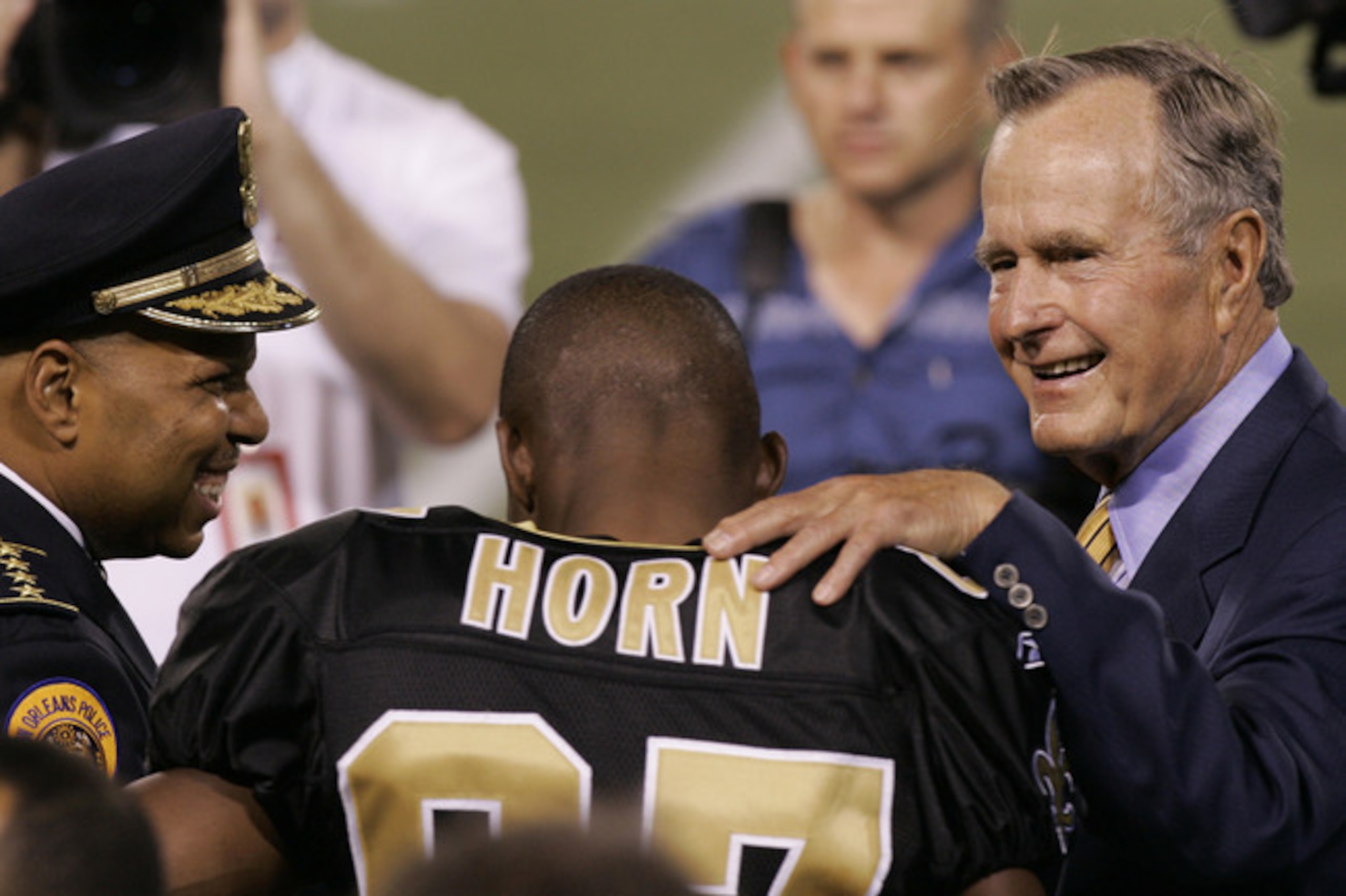 Horn with former President George H. W. Bush at the Saints' 2005 "home opener" in New York.