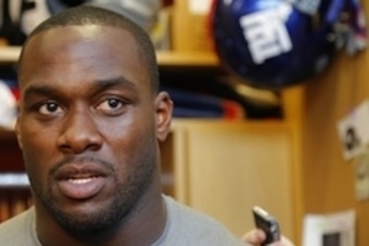 Jun 8, 2015; East Rutherford, NJ, USA;  New York Giants middle linebacker Jon Beason (52) speaks to media after organized team activities at Quest Diagnostics Training Center.  Mandatory Credit: Noah K. Murray-USA TODAY