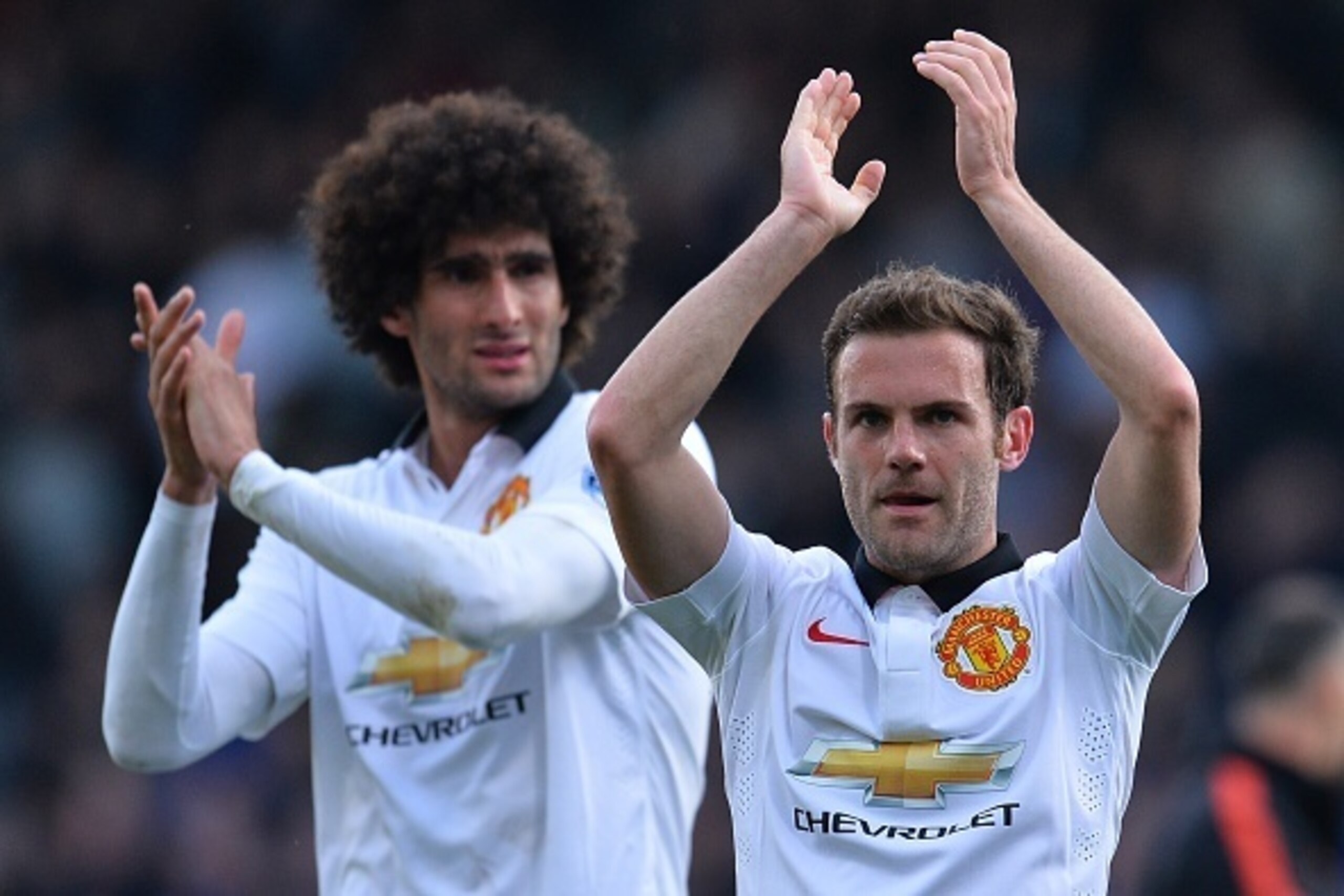 Manchester United's Belgian midfielder Marouane Fellaini (L) and Manchester United's Spanish midfielder Juan Mata (R) applaud at the end of the English Premier League football match between Crystal Palace and Manchester United at Selhurst Park in south Lo Manchester United's Belgian midfielder Marouane Fellaini (L) and Manchester United's Spanish midfielder Juan Mata (R) applaud at the end of the English Premier League football match between Crystal Palace and Manchester United at Selhurst Park in south Lo