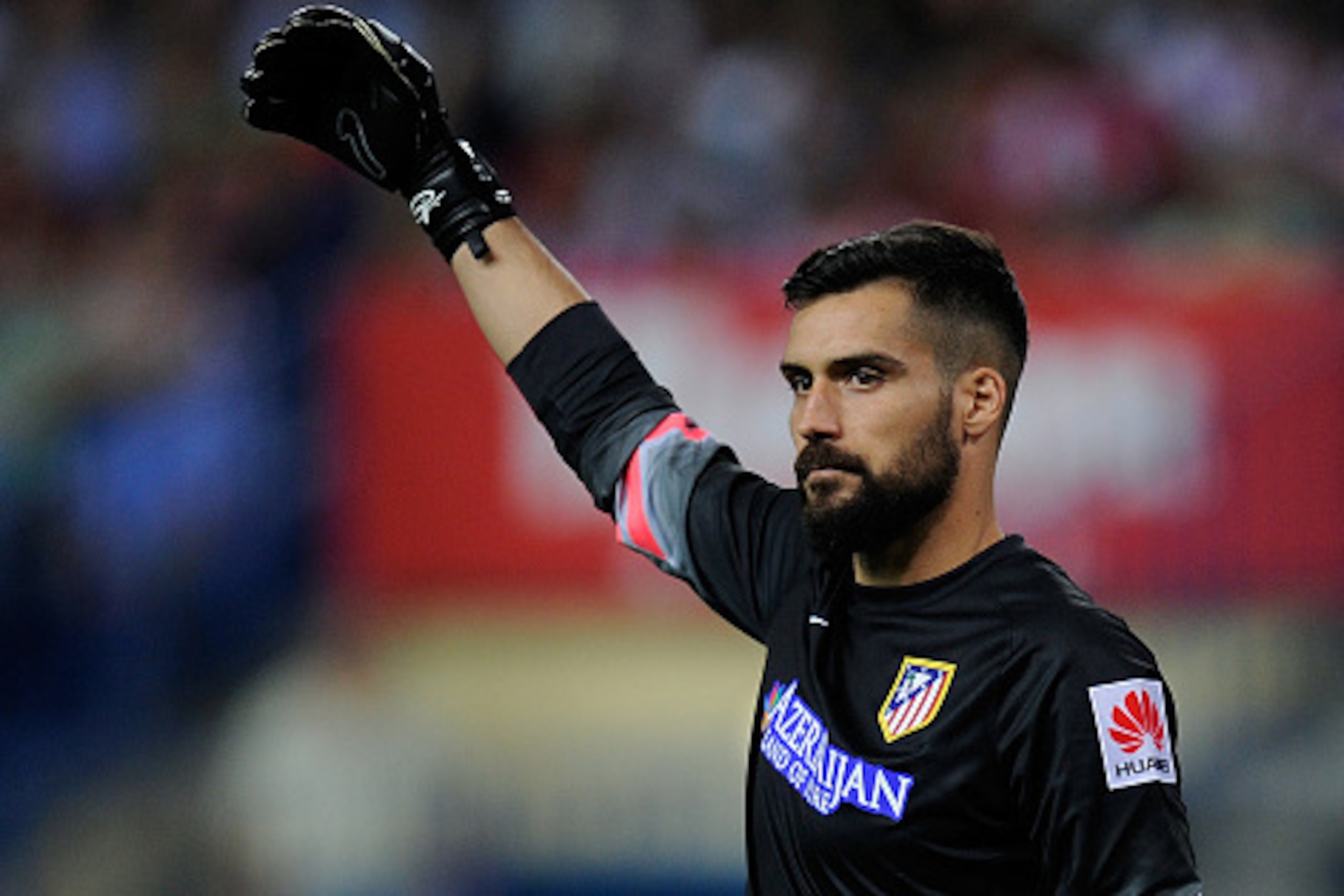 MADRID, SPAIN - SEPTEMBER 20:  Miguel Angel Moya of Club Atletico de Madrid organizes his team for a corner kick by Real Club Celta de Vigo during the La Liga match at the Vicente Calderon stadium on September 20, 2014 in Madrid, Spain.  (Photo by Denis D