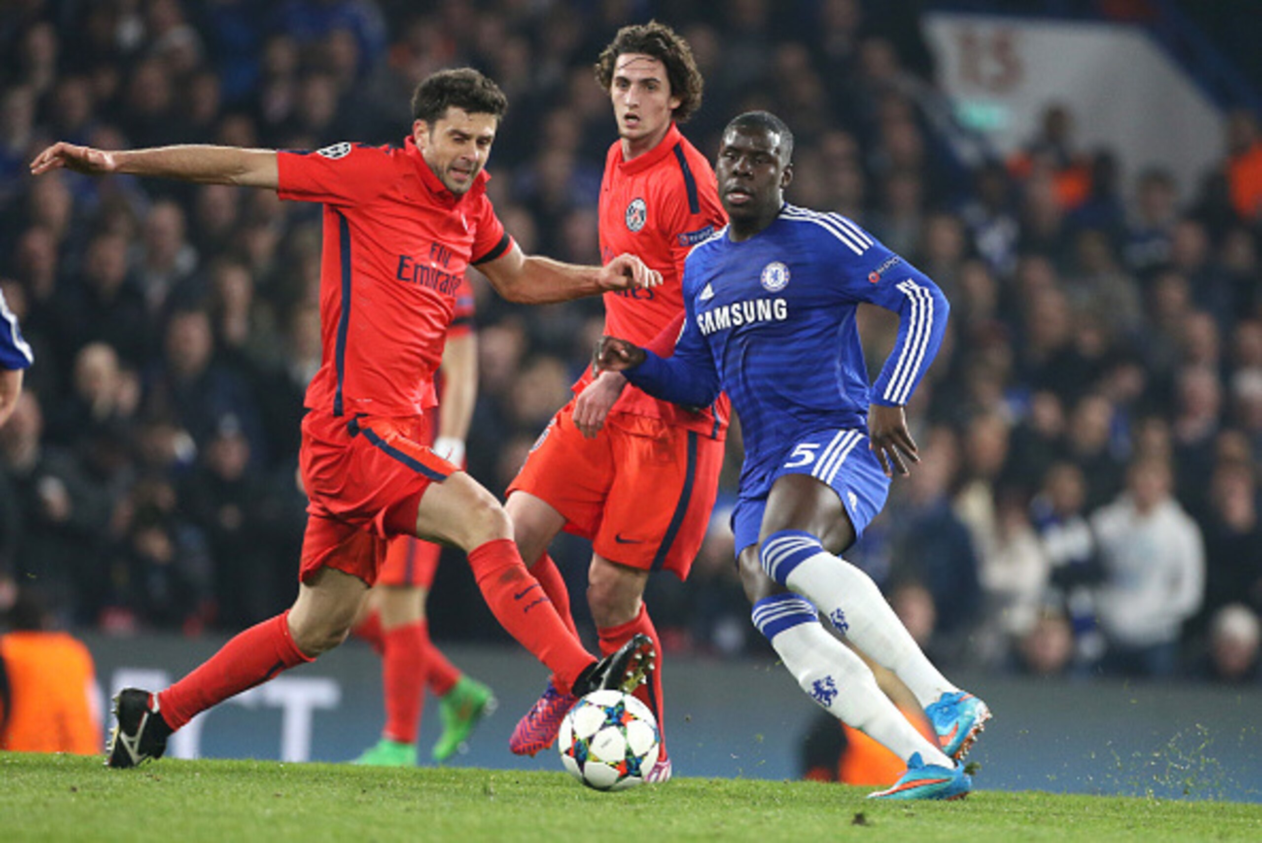 LONDON, ENGLAND - MARCH 11: Thiago Motta of PSG, Adrien Rabiot of PSG and Kurt Zouma of Chelsea in action during the UEFA Champions League Round of 16, second leg match between Chelsea FC and Paris Saint-Germain FC at Stamford Bridge stadium on March 11, 