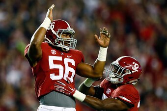 TUSCALOOSA, AL - NOVEMBER 29:  Tim Williams #56 of the Alabama Crimson Tide celebrates sacking Nick Marshall #14 of the Auburn Tigers in the fourth quarter during the Iron Bowl at Bryant-Denny Stadium on November 29, 2014 in Tuscaloosa, Alabama.  (Photo b