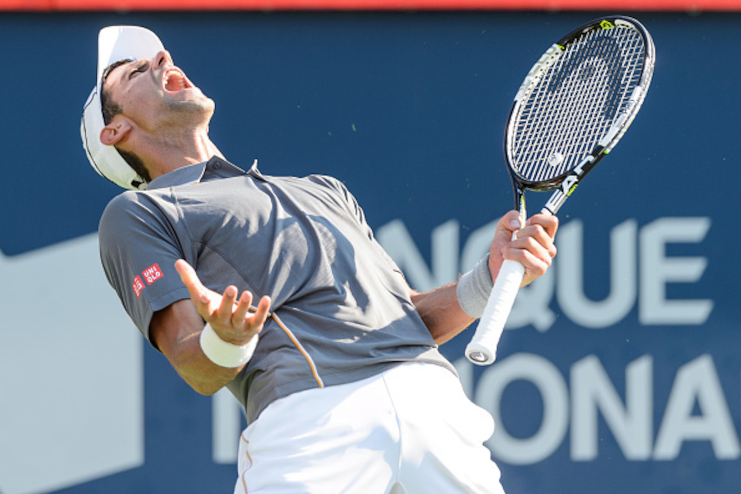 MONTREAL, ON - AUGUST 16:   Novak Djokovic of Serbia reacts after loosing a point against Andy Murray of Great Britain during day seven of the Rogers Cup at Uniprix Stadium on August 16, 2015 in Montreal, Quebec, Canada.  (Photo by Minas Panagiotakis/Gett