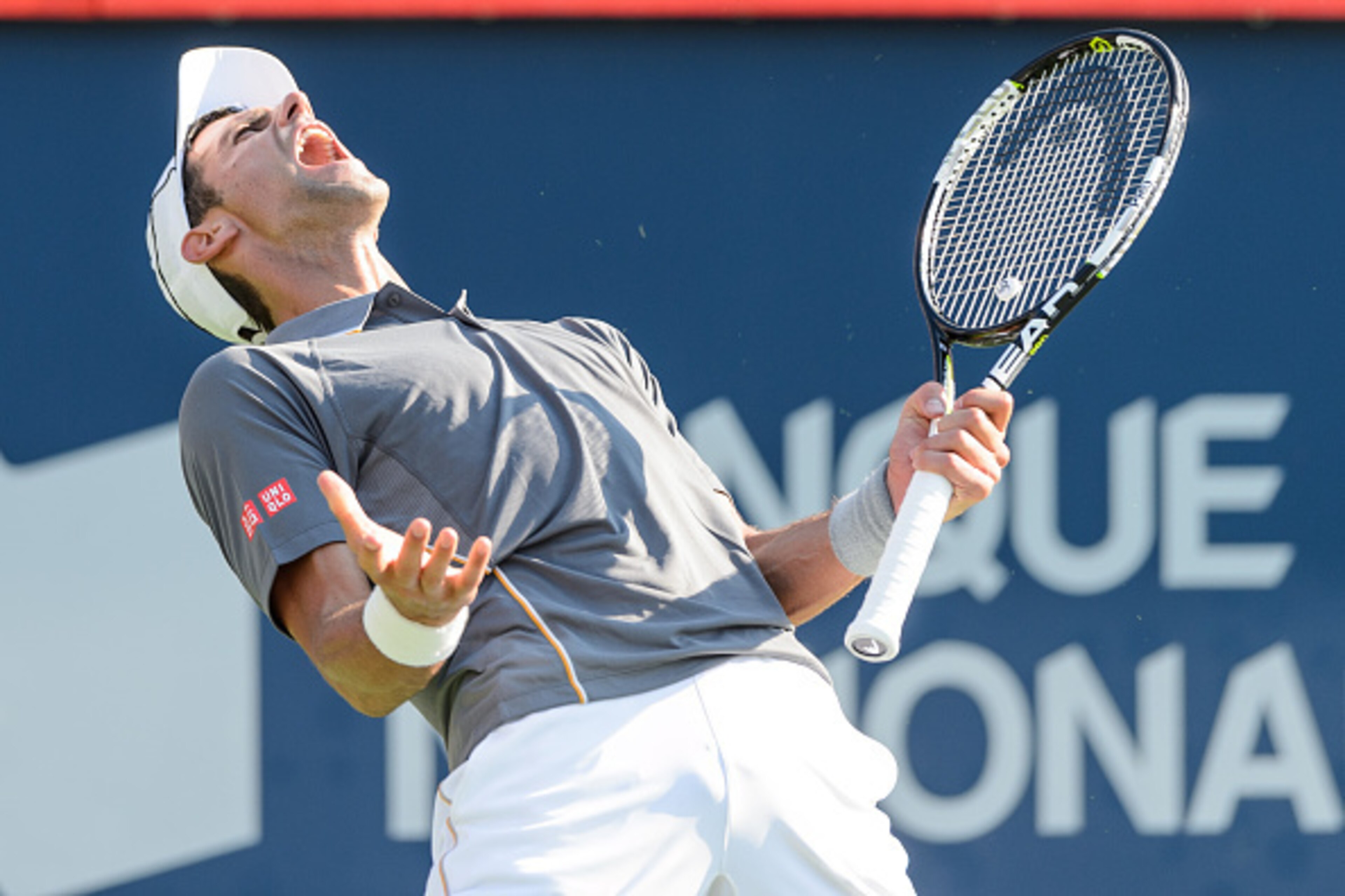 MONTREAL, ON - AUGUST 16:   Novak Djokovic of Serbia reacts after loosing a point against Andy Murray of Great Britain during day seven of the Rogers Cup at Uniprix Stadium on August 16, 2015 in Montreal, Quebec, Canada.  (Photo by Minas Panagiotakis/Gett