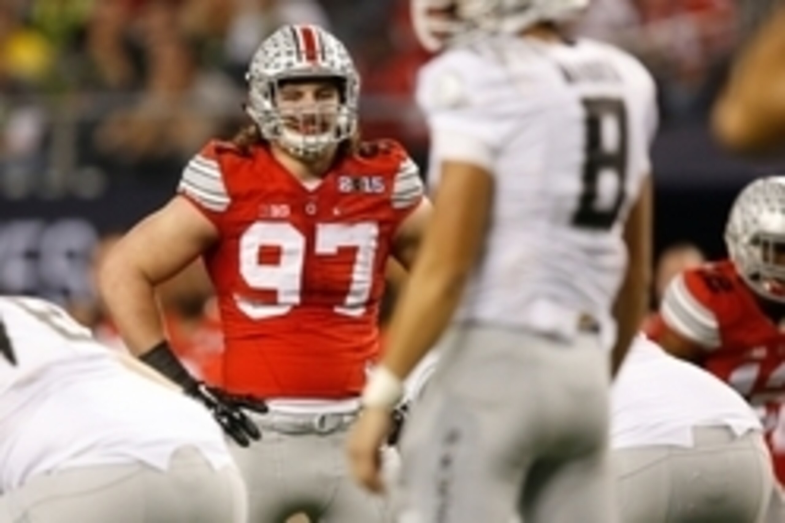 Jan 12, 2015; Arlington, TX, USA; Ohio State Buckeyes defensive lineman Joey Bosa (97) in game action against the Oregon Ducks in the 2015 CFP National Championship Game at AT&T Stadium. Ohio State won 42-20. Mandatory Credit: Tim Heitman-USA TODAY Sports
