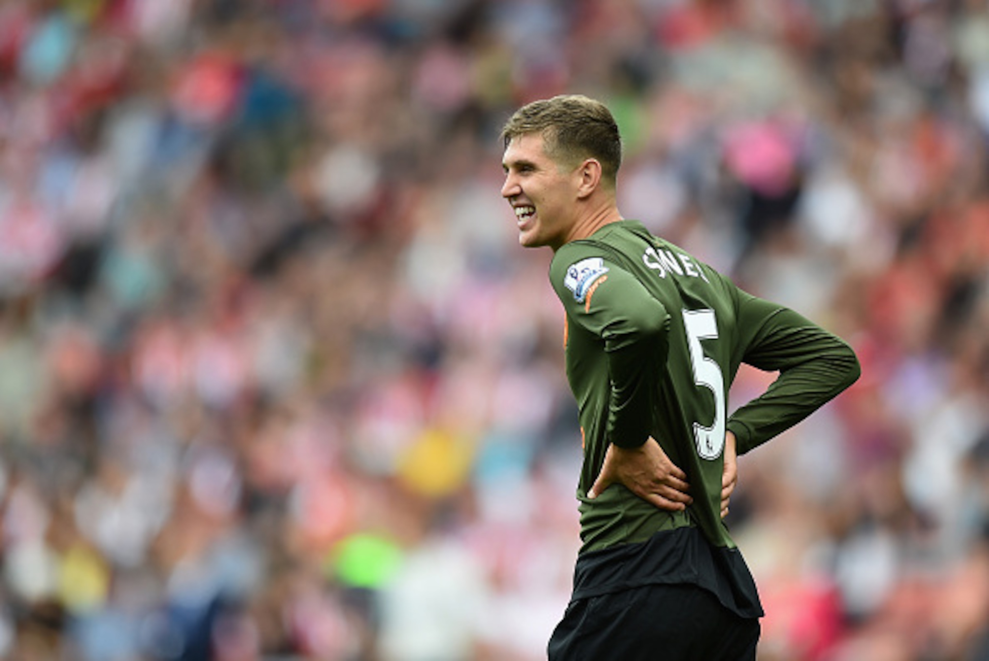 SOUTHAMPTON, ENGLAND - AUGUST 15:  John Stones of Everton laughs during the Barclays Premier League match between Southampton and Everton at St Mary's Stadium on August 15, 2015 in Southampton, United Kingdom.  (Photo by Christopher Lee/Getty Images)