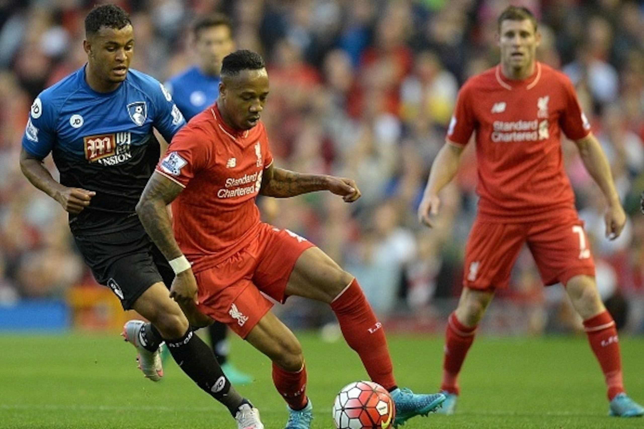 Liverpool's English defender Nathaniel Clyne (Front 2nd L) in action against Bournemouth's Norwegian striker Joshua King during the English Premier League football match between Liverpool and Bournemouth at the Anfield stadium in Liverpool, north-west Eng