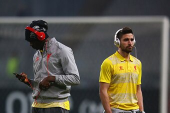 ISTANBUL, TURKEY - FEBRUARY 26:  Mario Balotelli and Fabio Borini of Liverpool (L) walk on the pitch prior to the UEFA Europa League Round of 32 second leg match between Besiktas JK and Liverpool FC on February 26, 2015 in Istanbul, Turkey.  (Photo by Ric