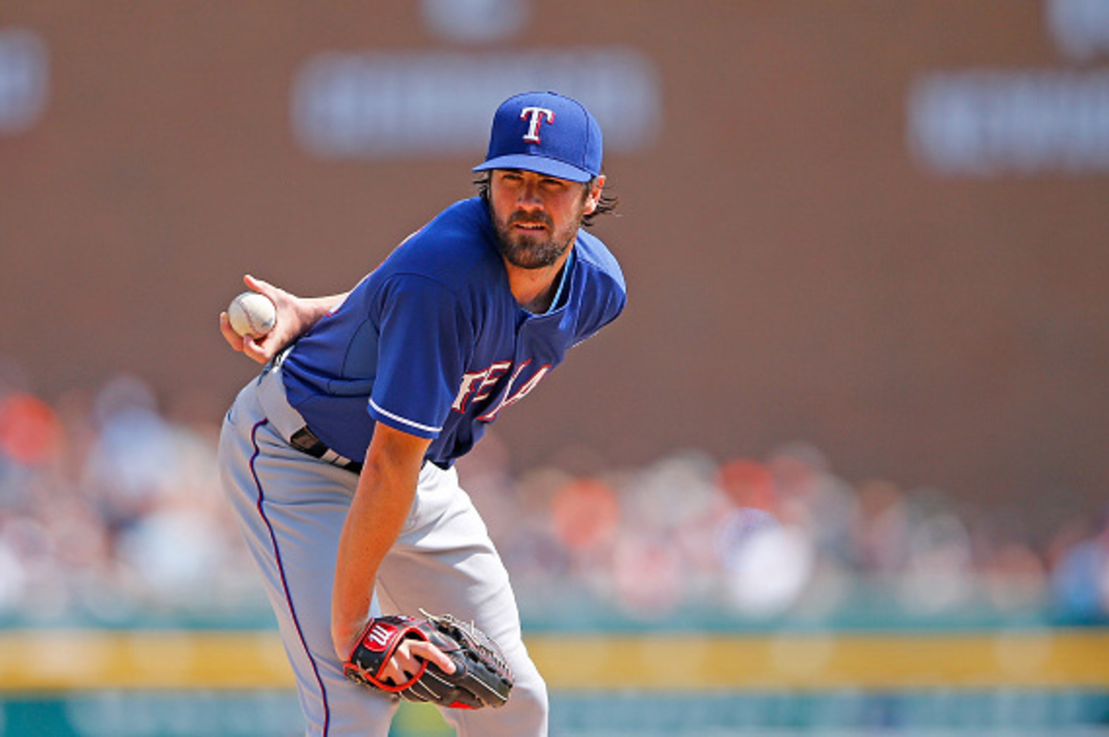 DETROIT, MI - AUGUST 23: Cole Hamels #35 of the Texas Rangers pitches during the fourth inning of the game against the Detroit Tigers on August 23, 2015 at Comerica Park in Detroit, Michigan. The Rangers defeated the Tigers 4-2. (Photo by Leon Halip/Getty